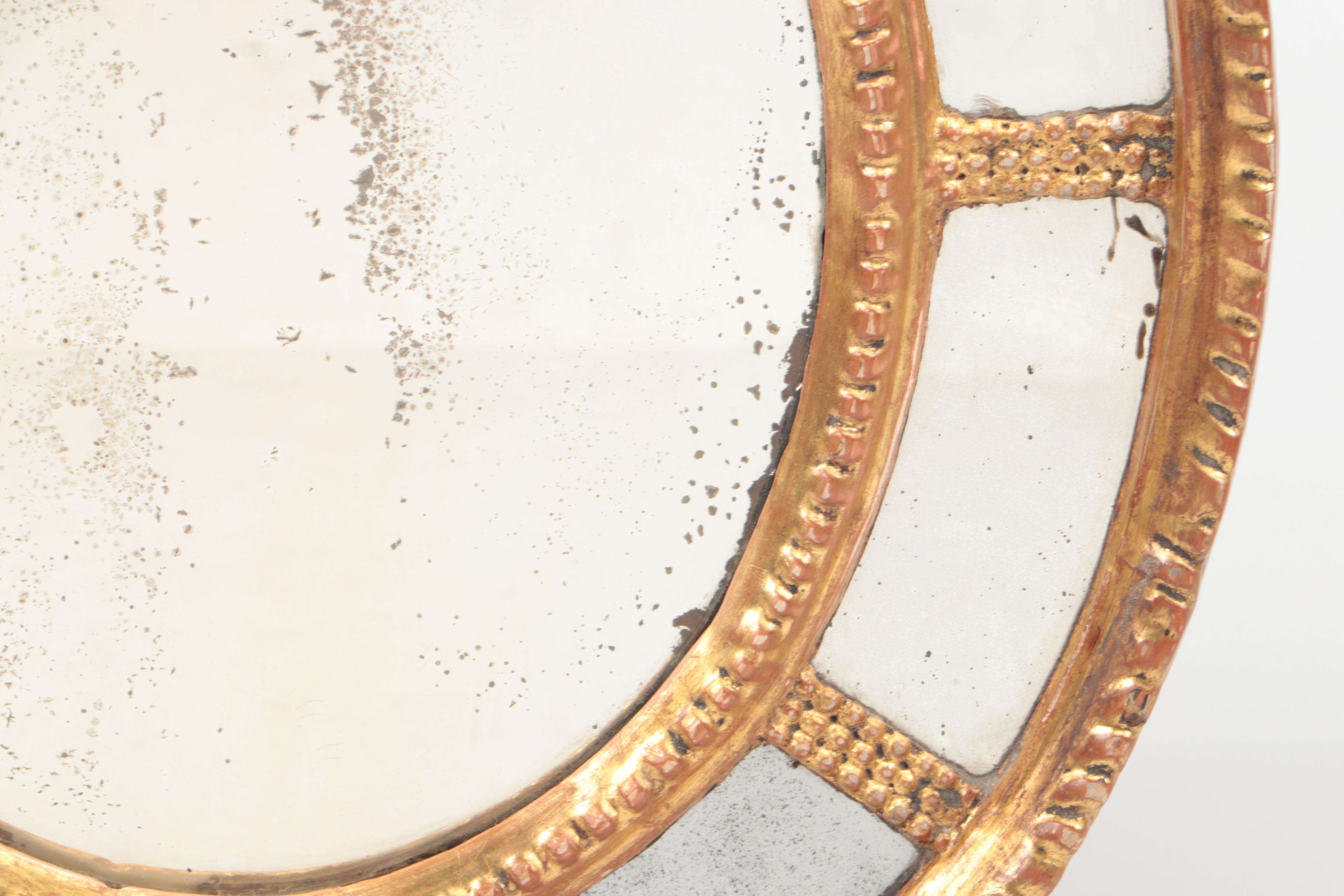 Adams Style Giltwood Oval Wall Mirror, Early 19th Century