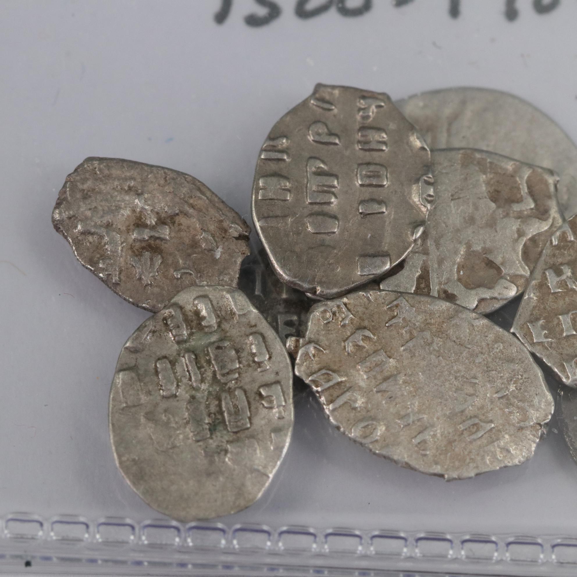 Twelve Russian Silver "Wire Money" Coins, ca. 1500 to 1700