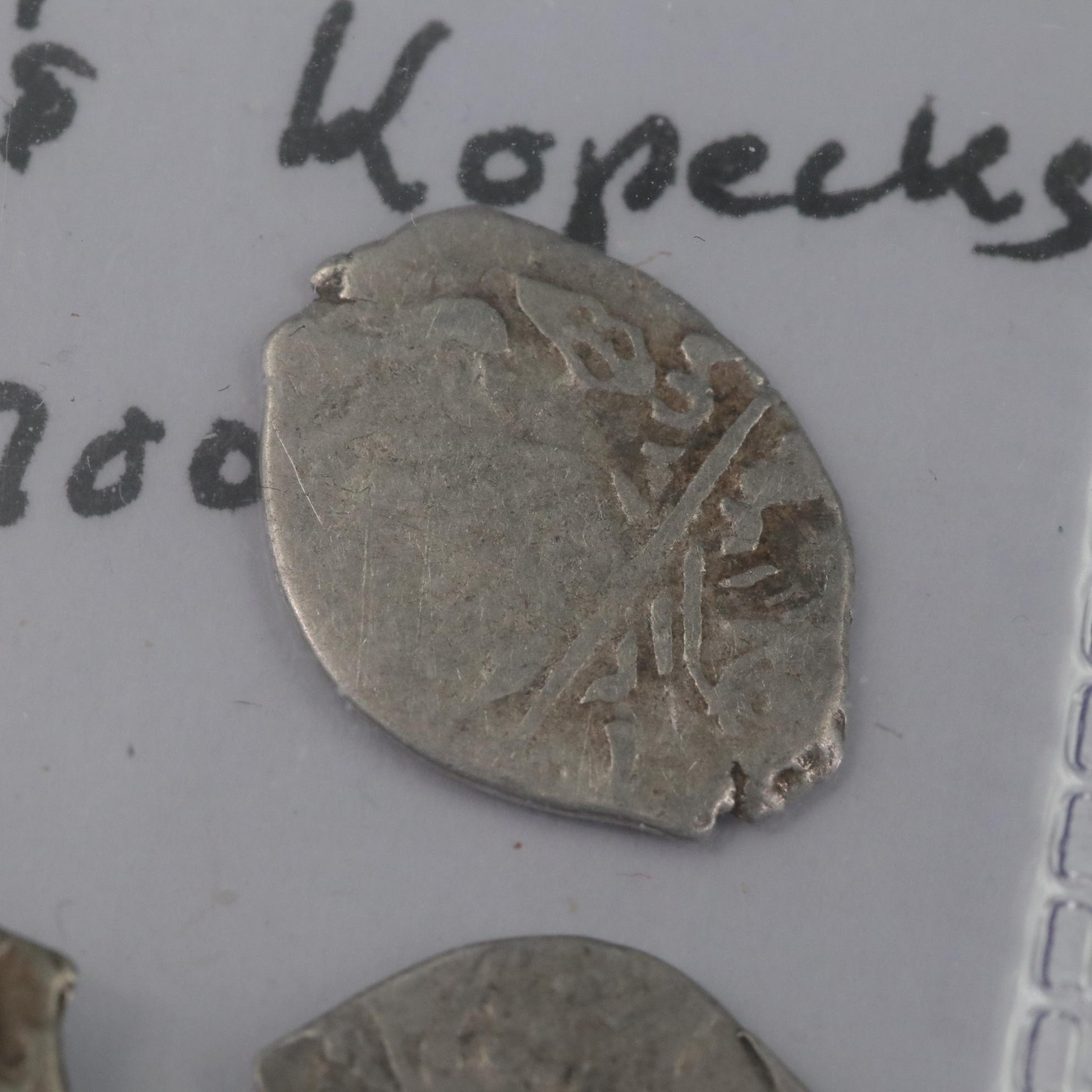 Twelve Russian Silver "Wire Money" Coins, ca. 1500 to 1700