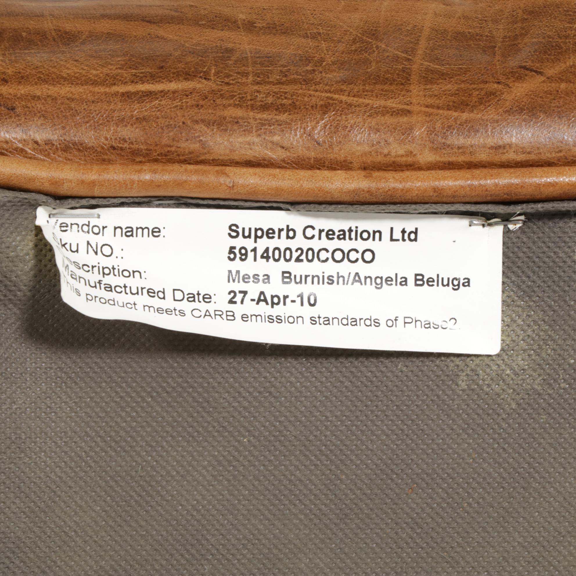 Distressed Brown Leather Sofa by Superb Creation Ltd. and Basket Weave Pillows