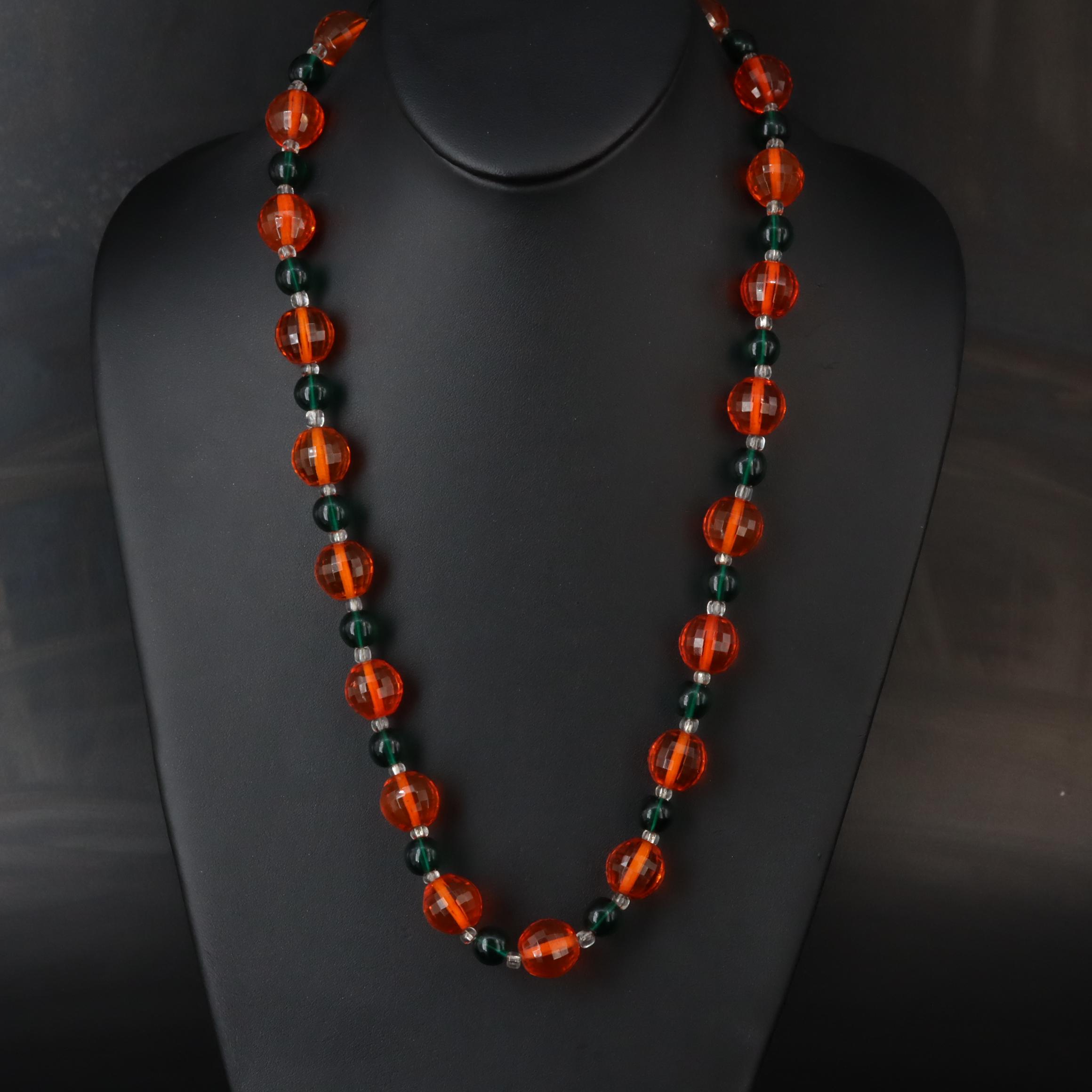 The Indigo Dragon and Art Glass Featured in Necklace and Pendant Collection