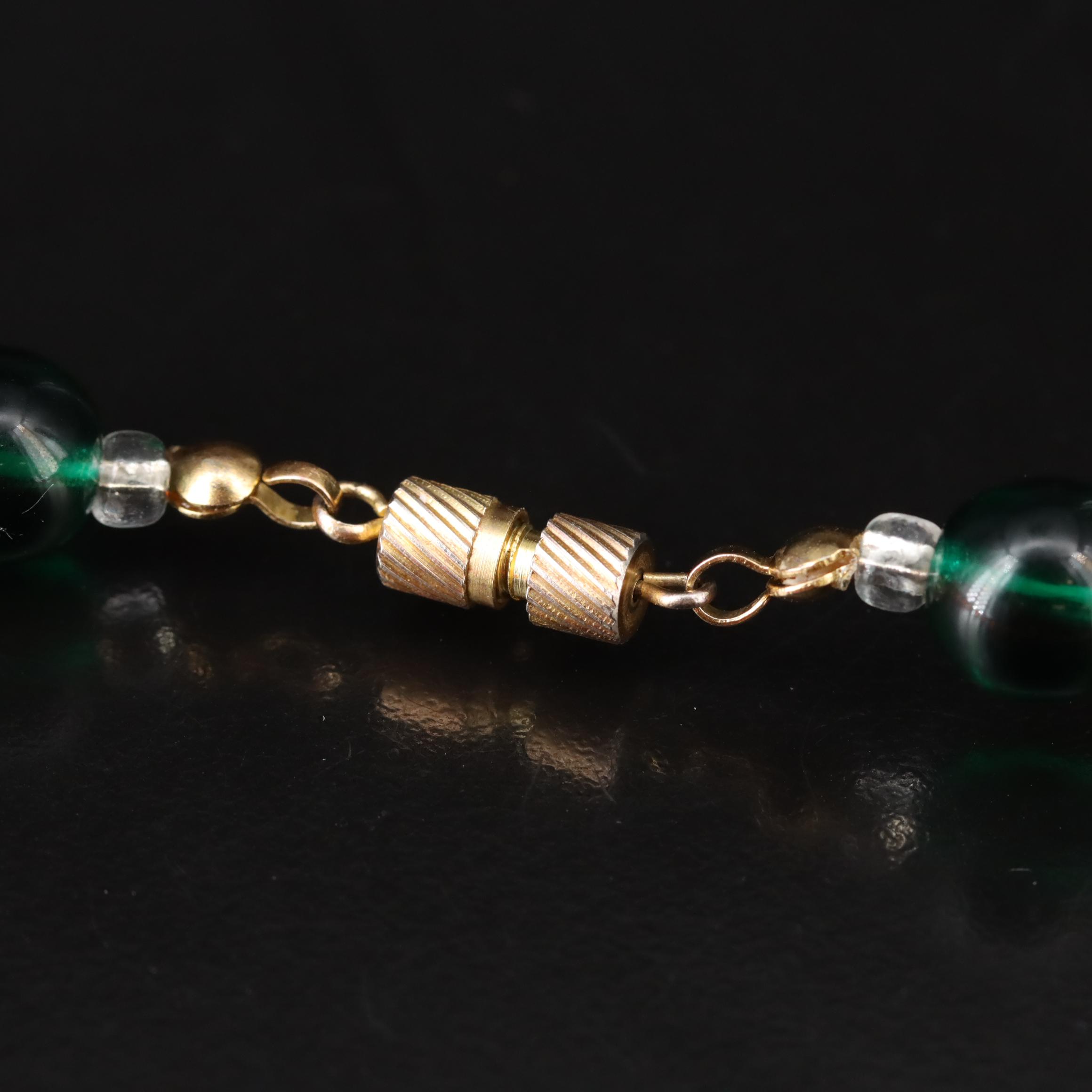 The Indigo Dragon and Art Glass Featured in Necklace and Pendant Collection