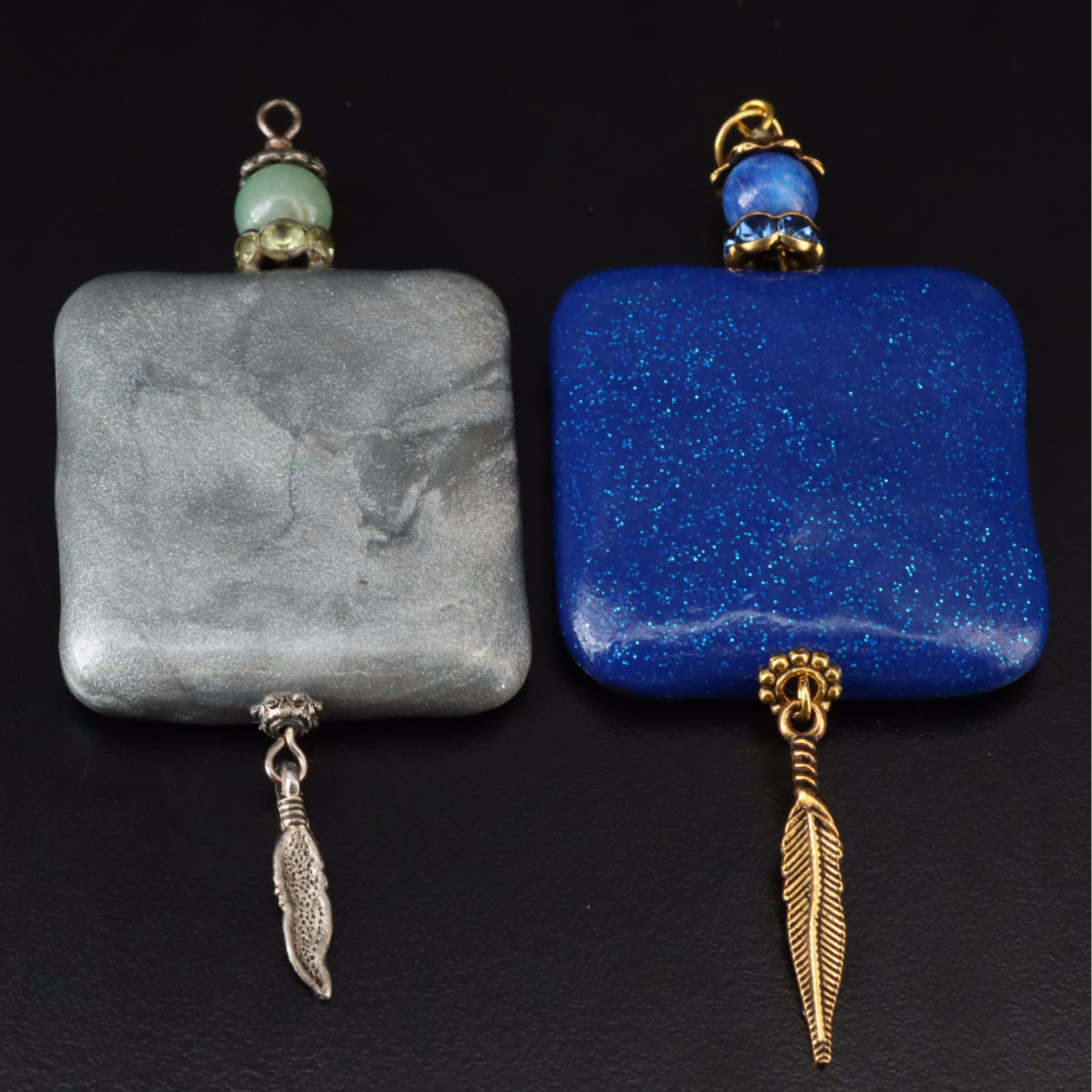 The Indigo Dragon and Art Glass Featured in Necklace and Pendant Collection