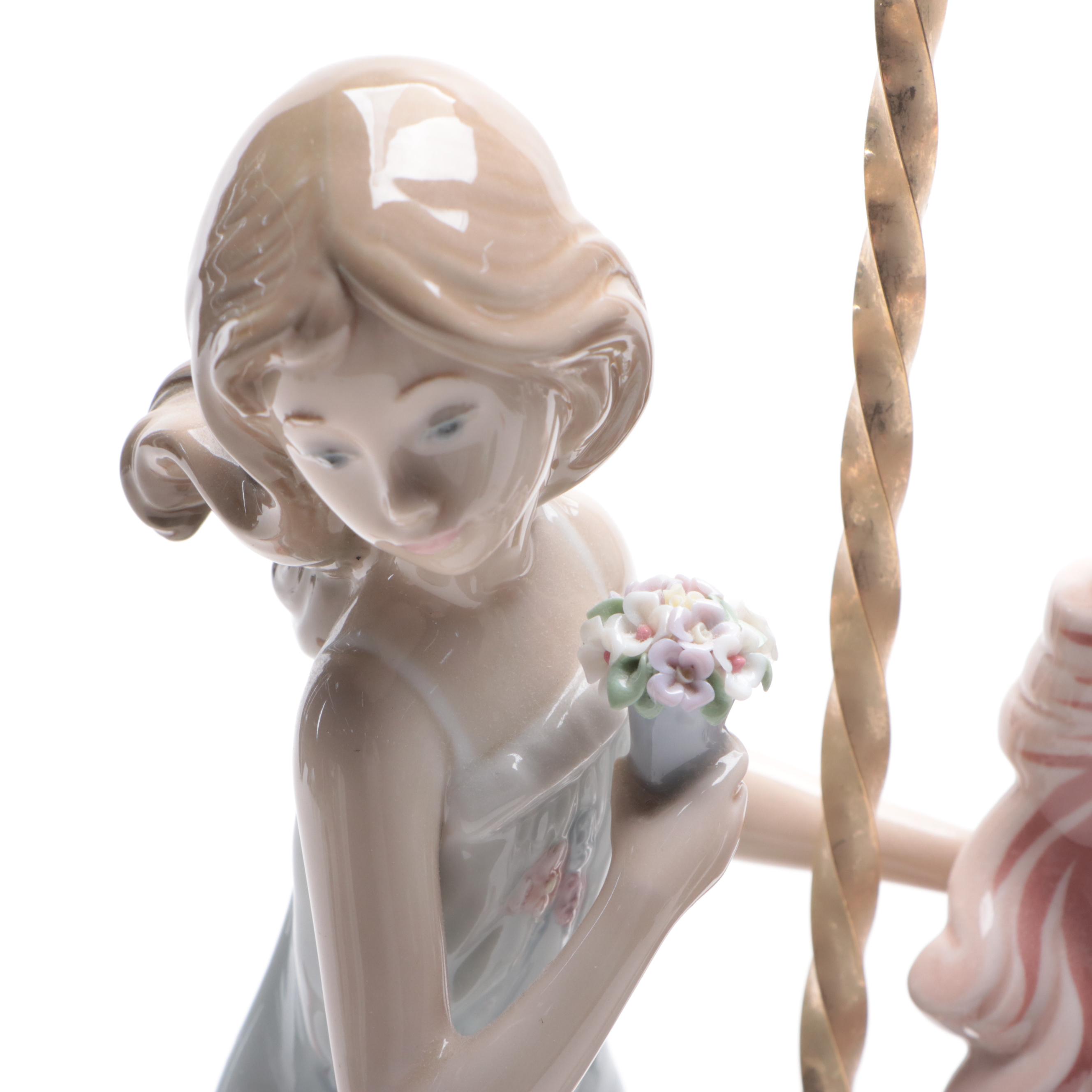 Lladró Porcelain Boy and Girl on Carousel Horses Figurines