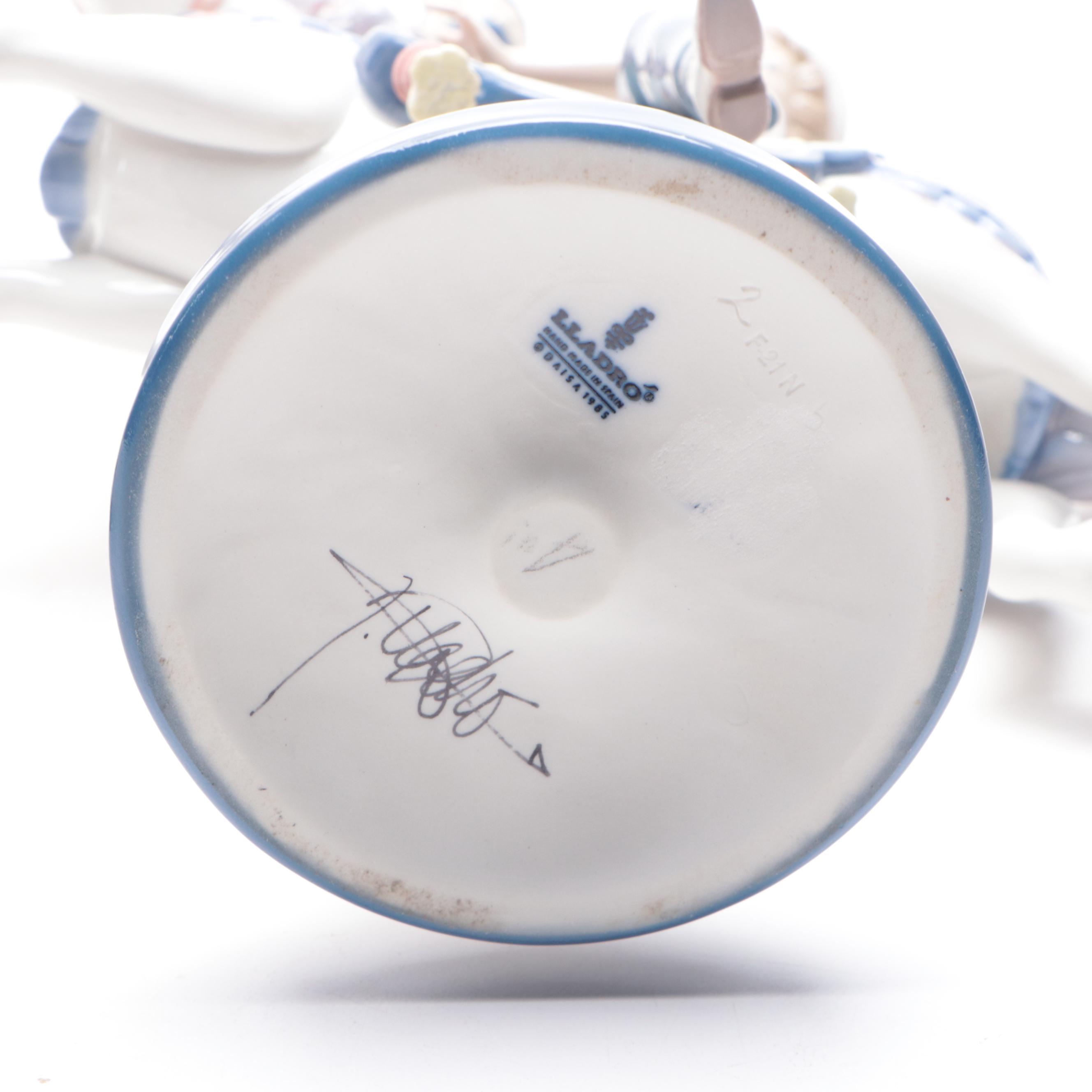 Lladró Porcelain Boy and Girl on Carousel Horses Figurines