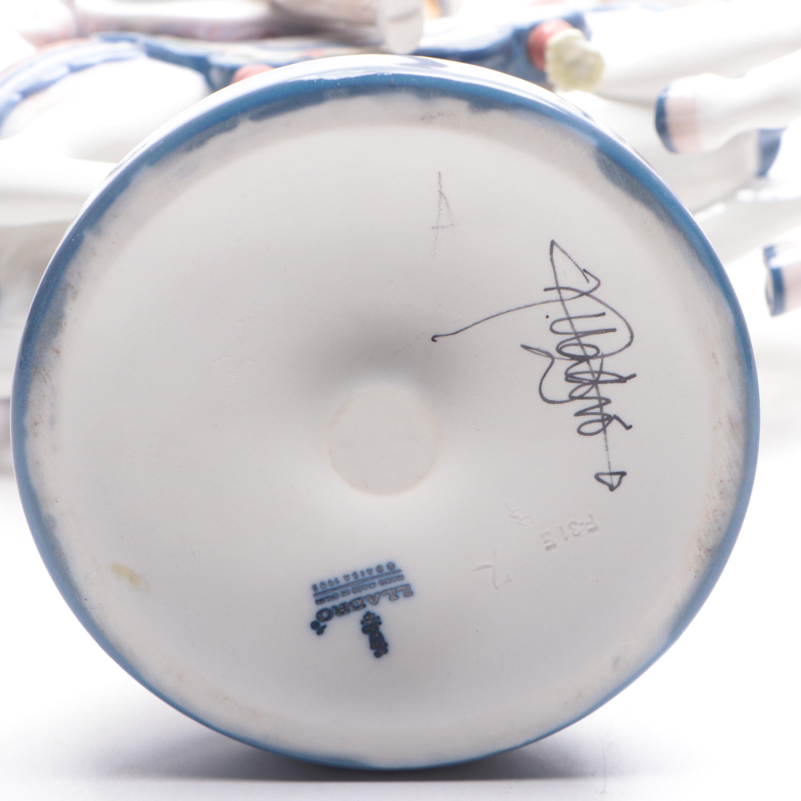 Lladró Porcelain Boy and Girl on Carousel Horses Figurines