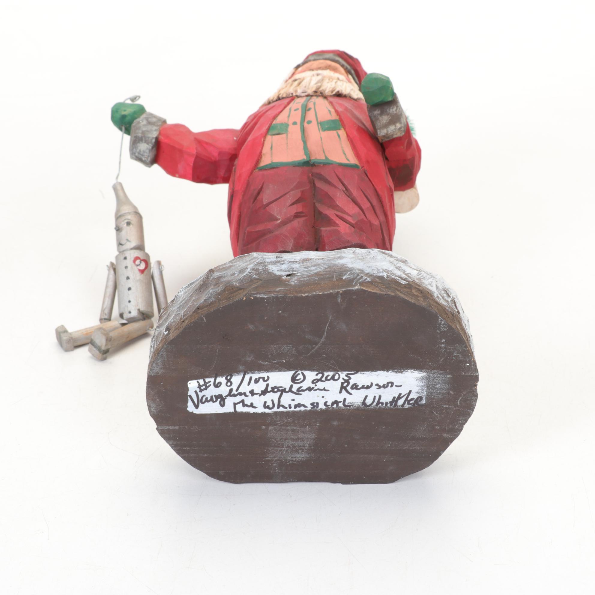 Carved Wood and Hand-Painted Folk Art Santa Figurines Including Rawson