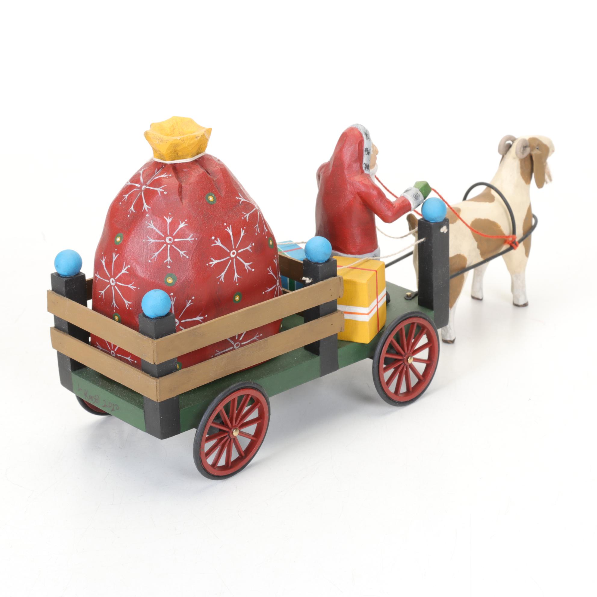 Carved Wood and Hand-Painted Folk Art Santa Figurines Including Rawson