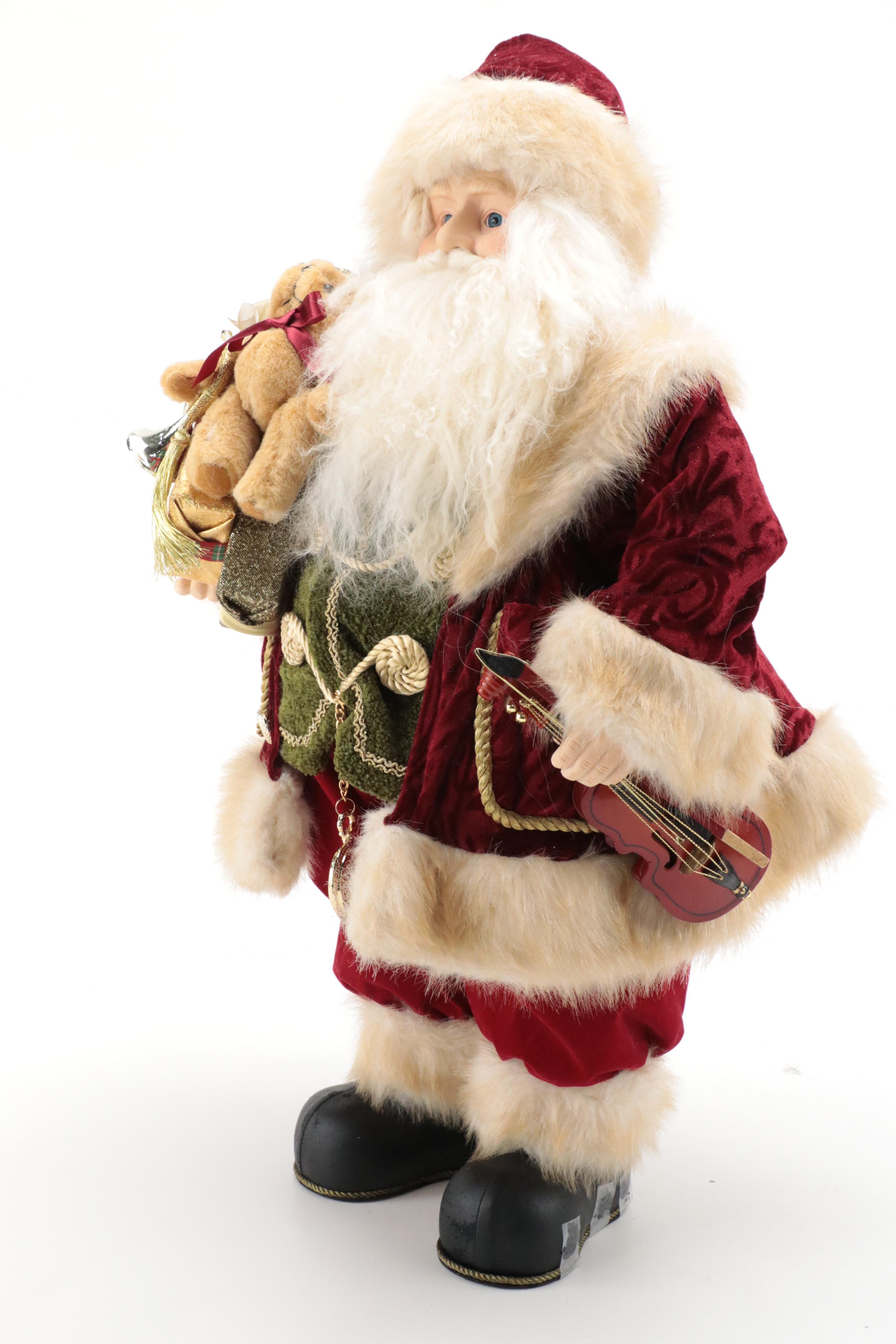 Faux Fur and Fabric Dressed Resin Santa Claus Figurines