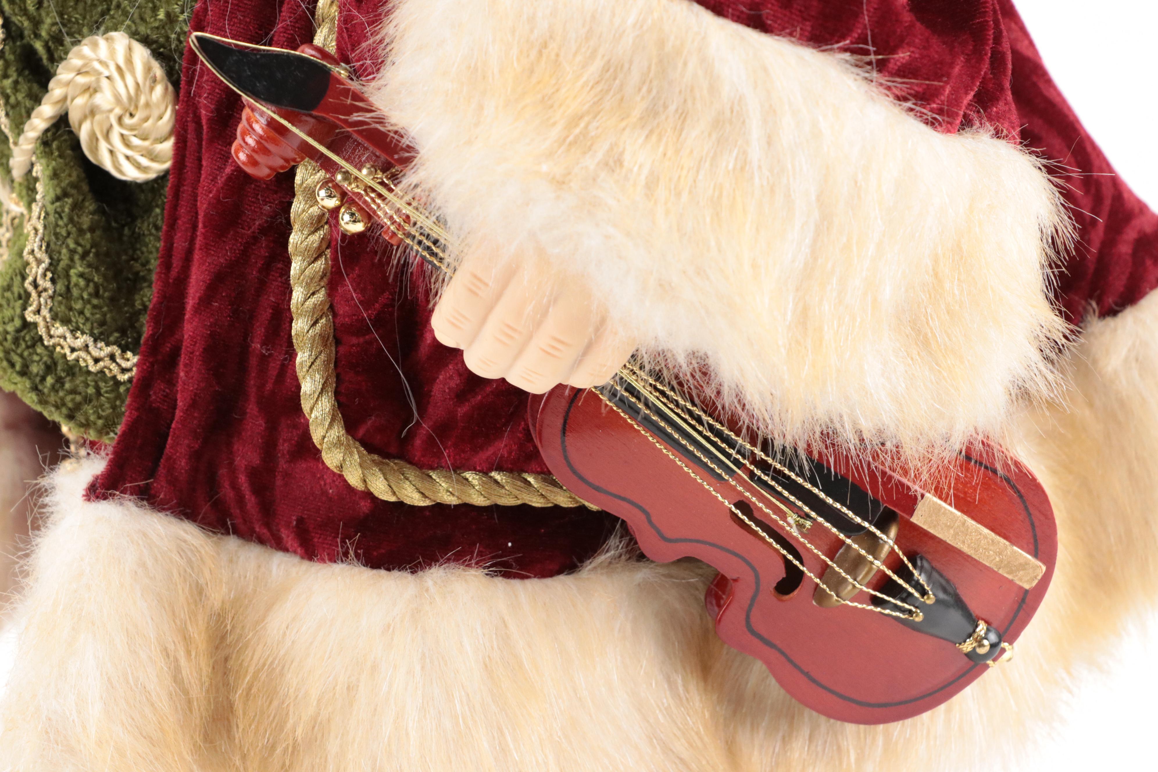 Faux Fur and Fabric Dressed Resin Santa Claus Figurines