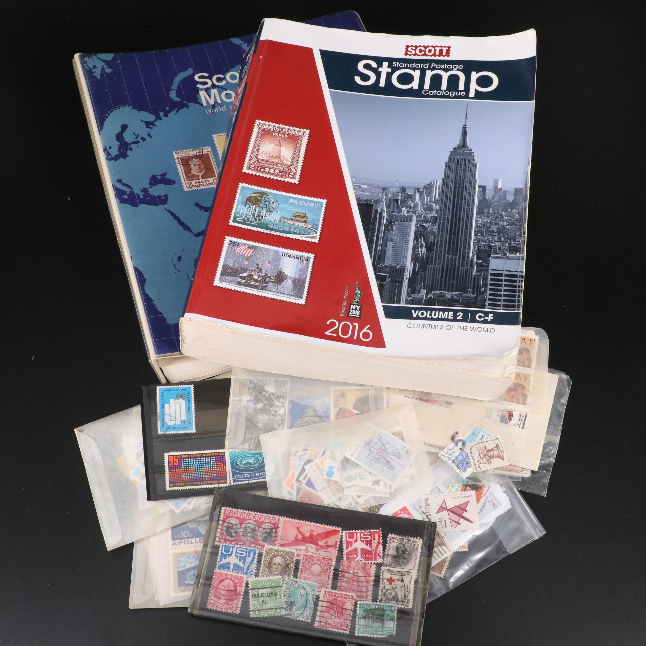 Assortment of World and U.S. Postage Stamps, Price Guide, and Binder