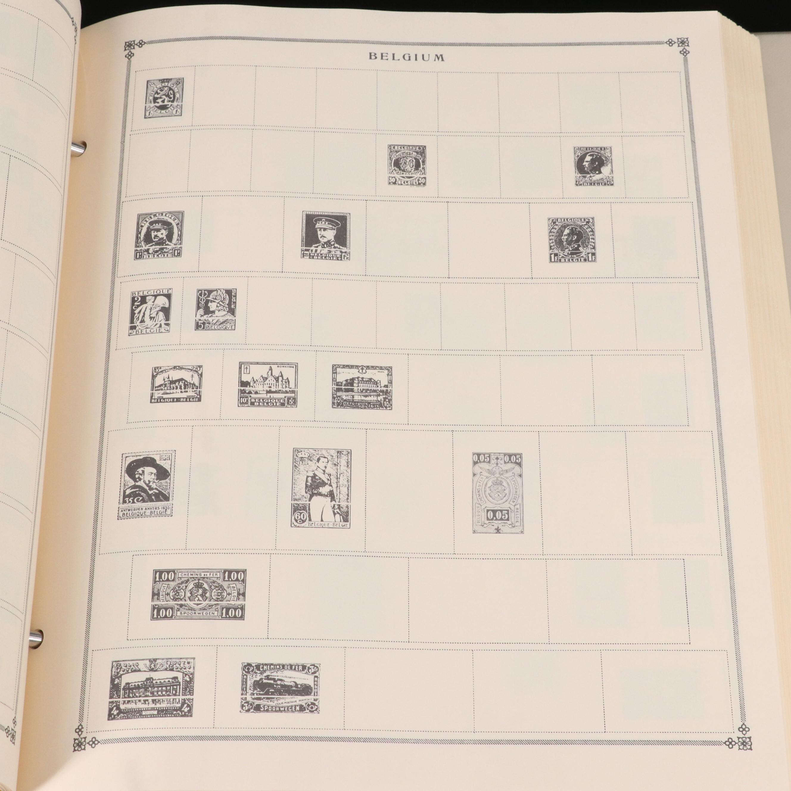 Assortment of World and U.S. Postage Stamps, Price Guide, and Binder