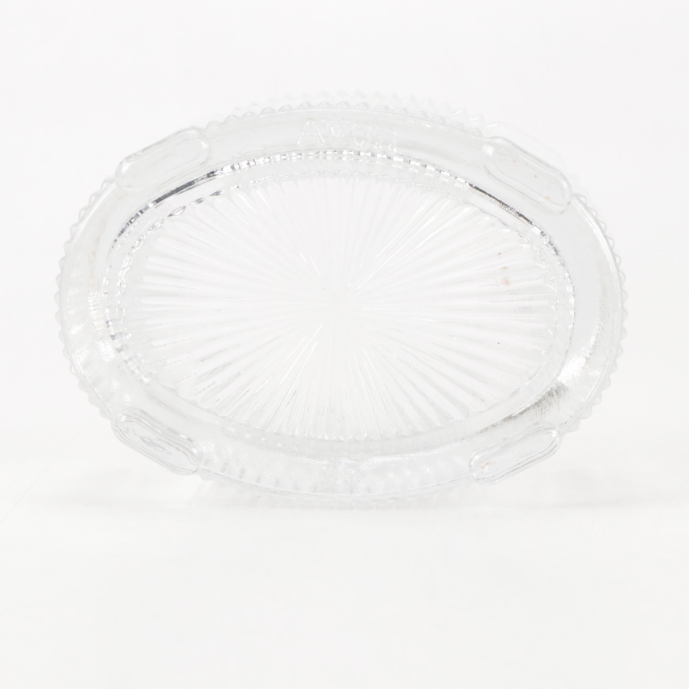 Mirrored Vanity Tray with Embossed Lidded Jars and Brass Candlesticks, 20th C.