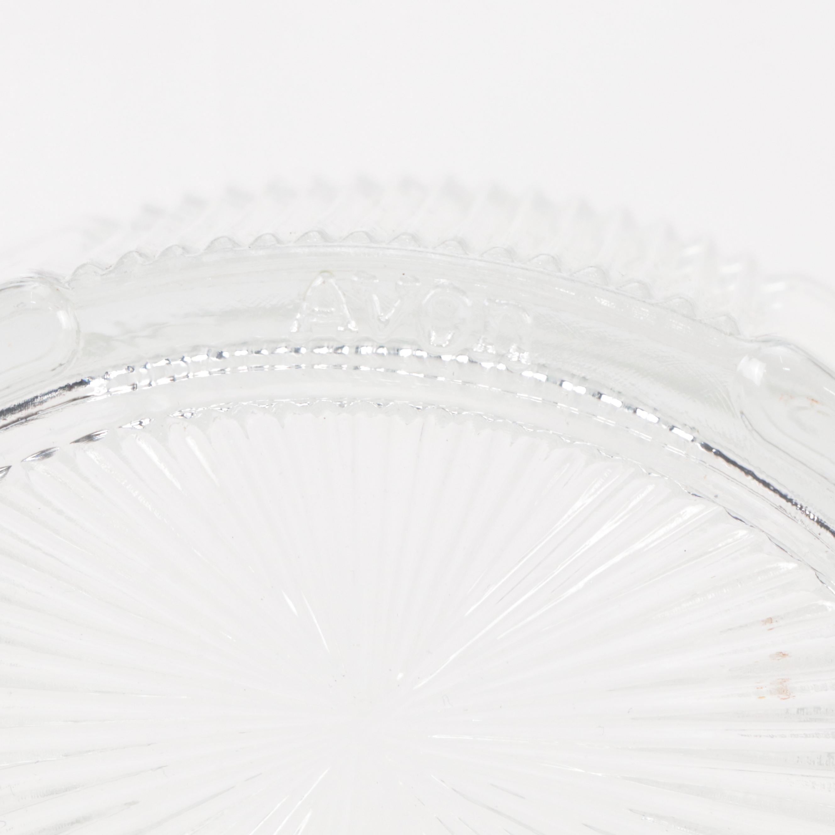 Mirrored Vanity Tray with Embossed Lidded Jars and Brass Candlesticks, 20th C.