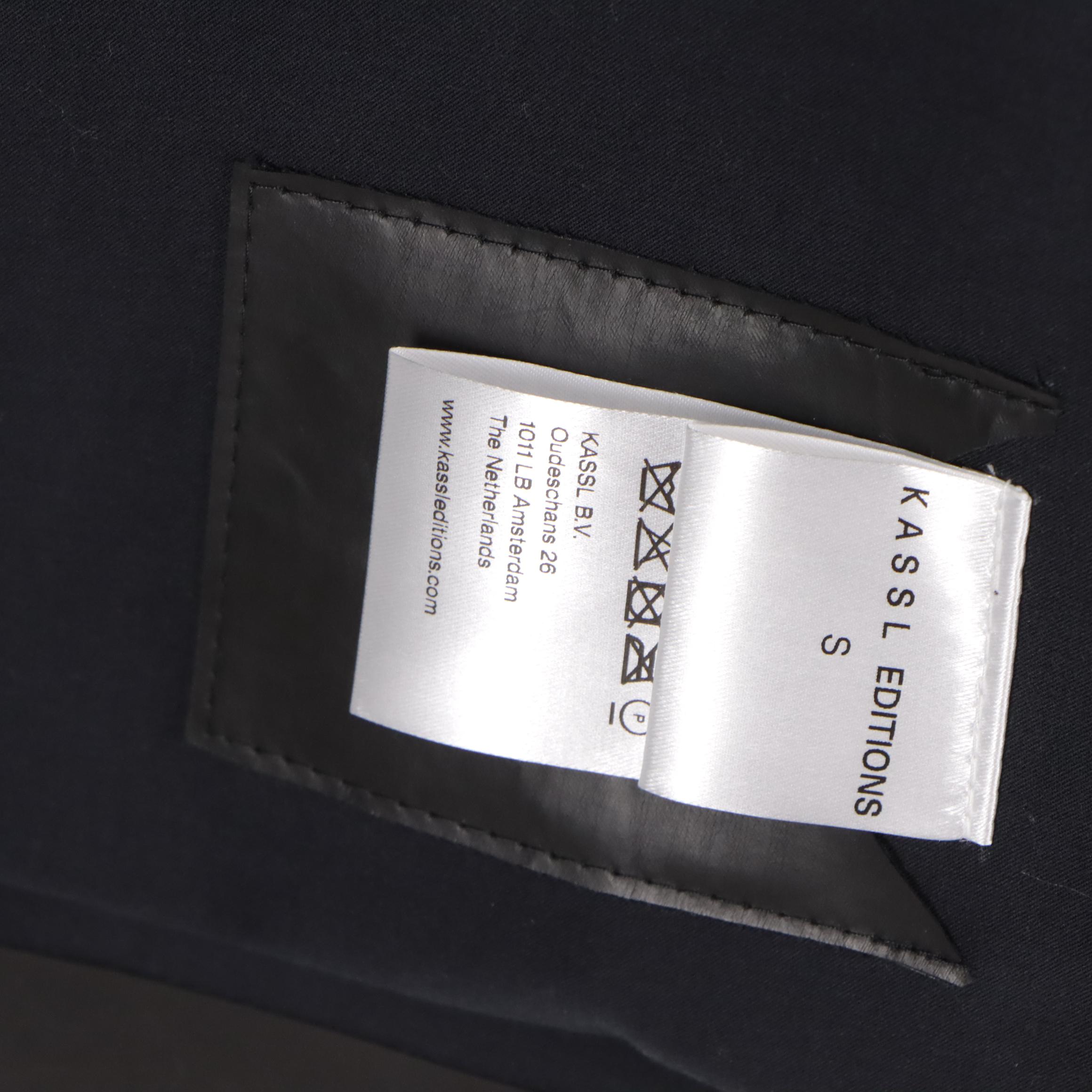 Kassl Editions Original Black Hip Oil Coat and White Oil Coat