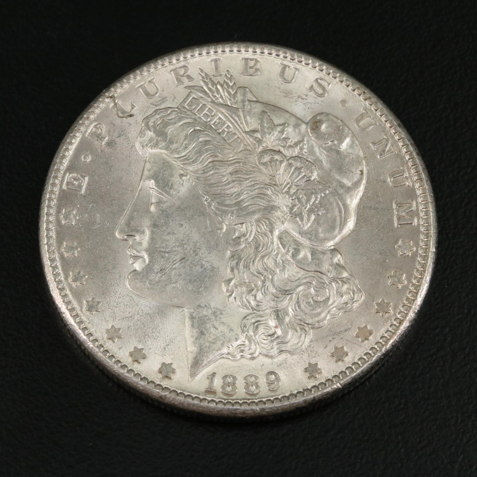 1889 and 1900 Morgan Silver Dollars