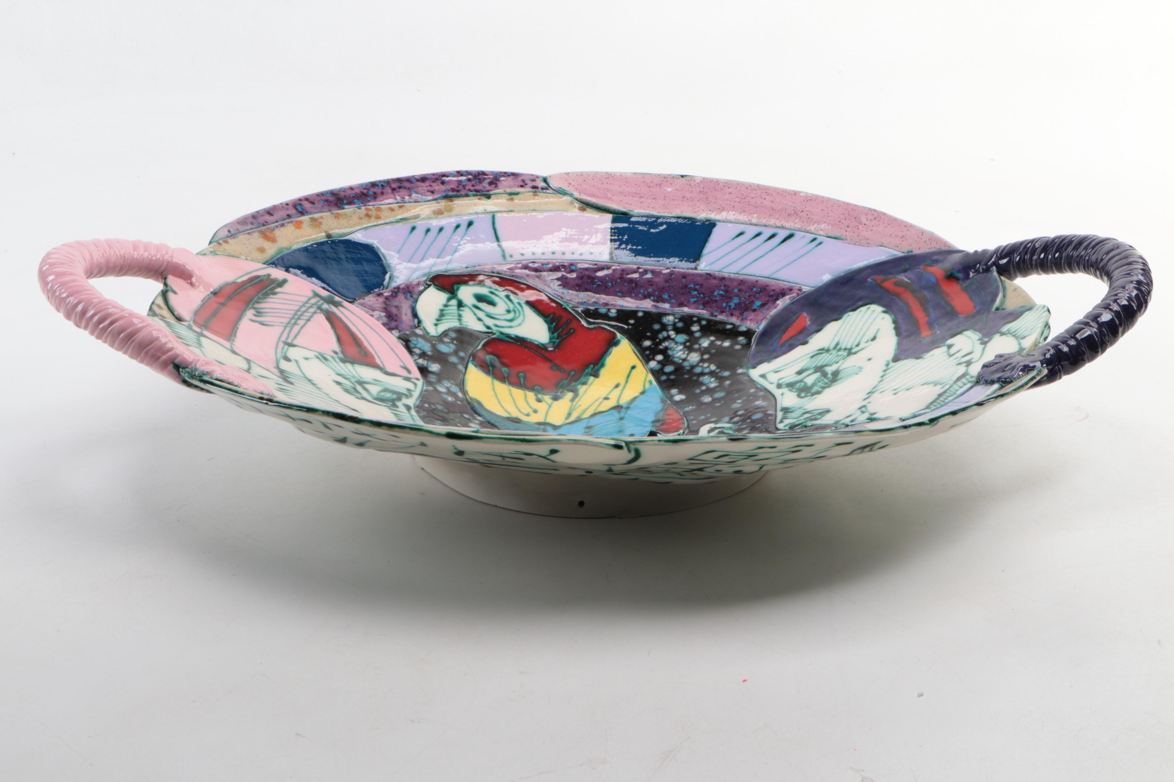 Juozas and Rasa Saldaitis Ceramic Handled Bowl with Faces and Parrot Motif