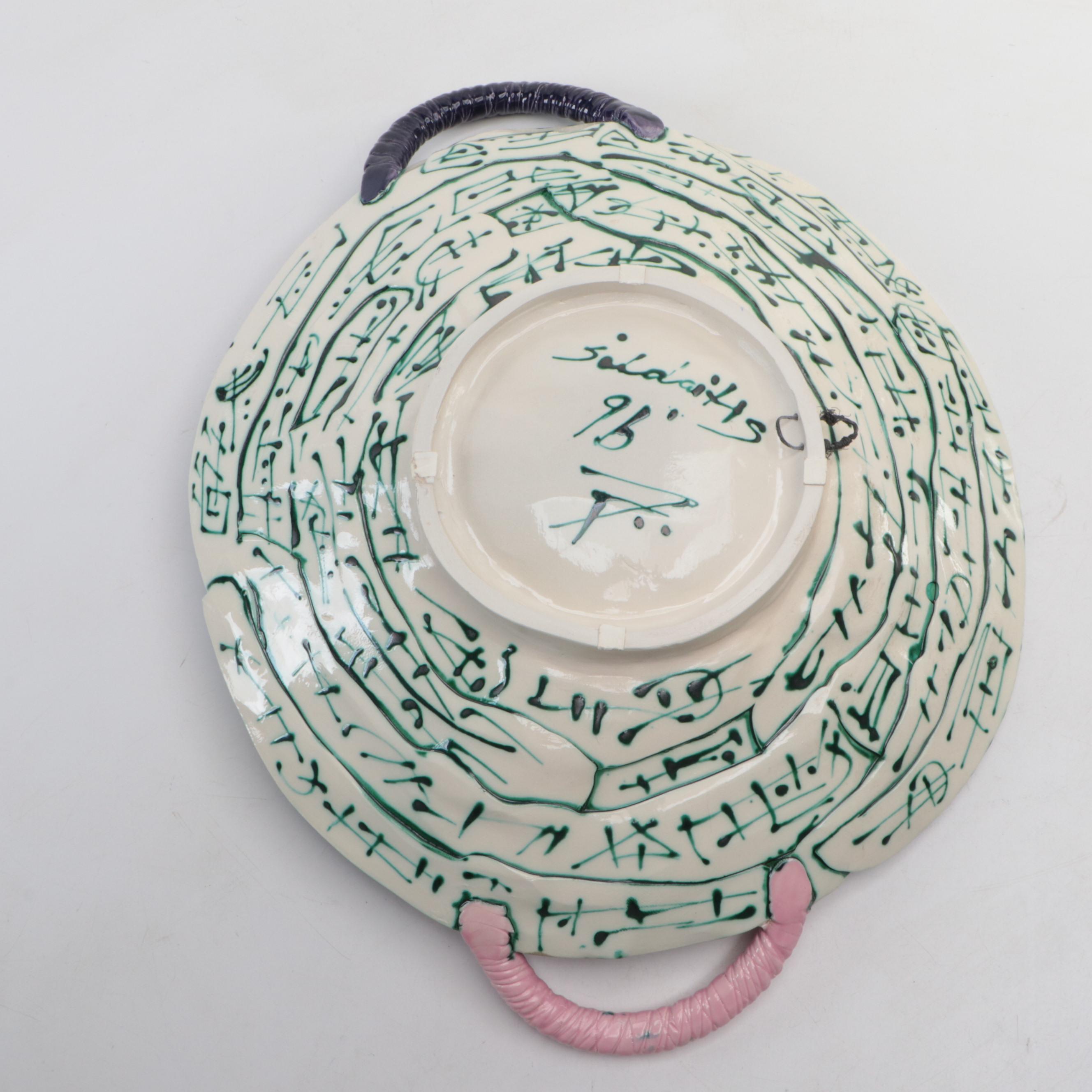 Juozas and Rasa Saldaitis Ceramic Handled Bowl with Faces and Parrot Motif