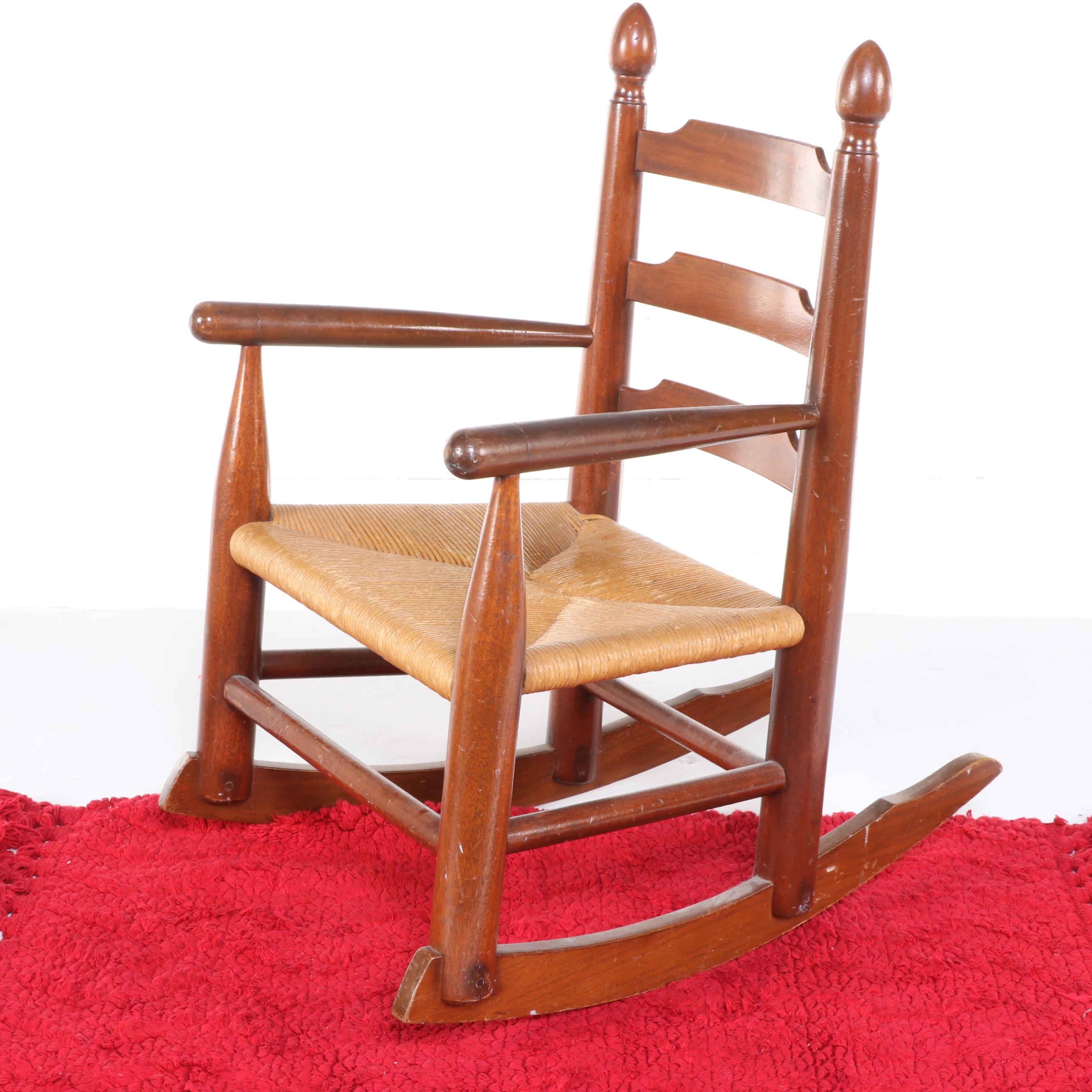Child-Sized Wood Rocking Chair, Accent Rug, Snowmen Plushes, and Pop-Up Book