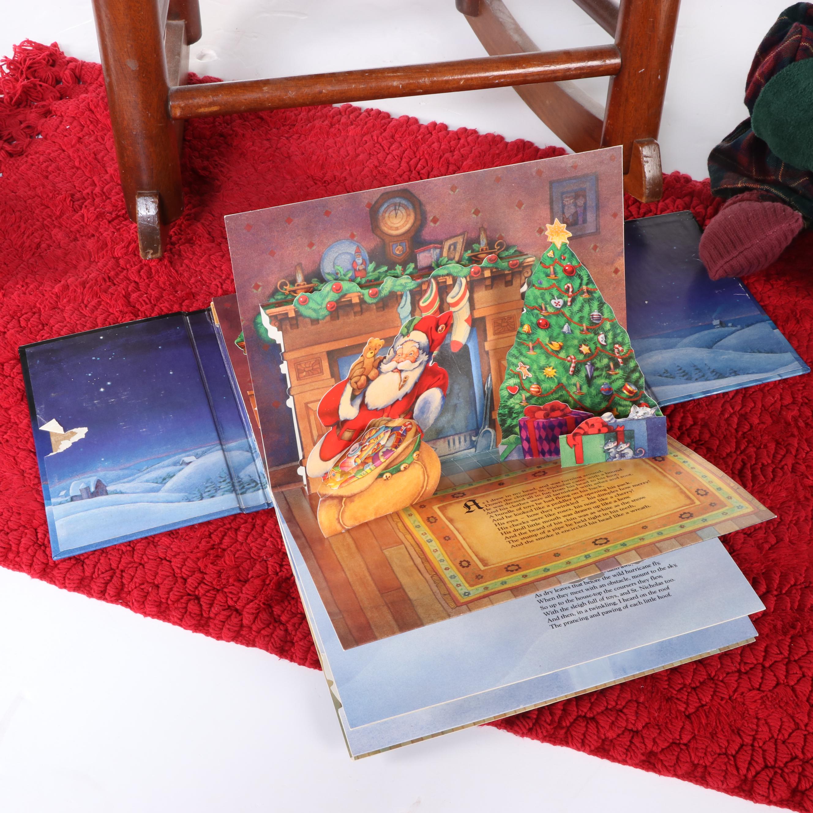Child-Sized Wood Rocking Chair, Accent Rug, Snowmen Plushes, and Pop-Up Book