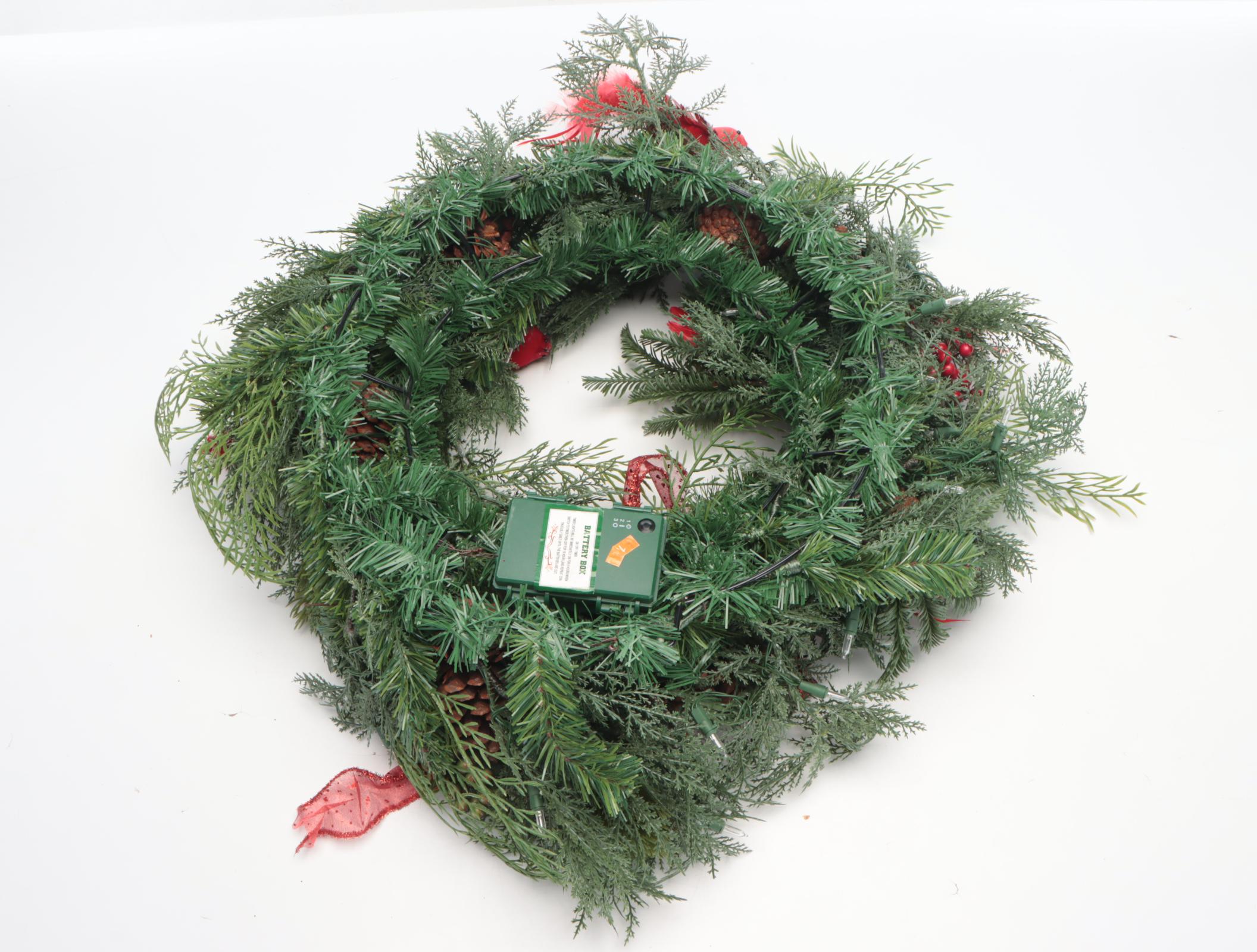 Red Candle Lantern and Artificial Christmas Wreath