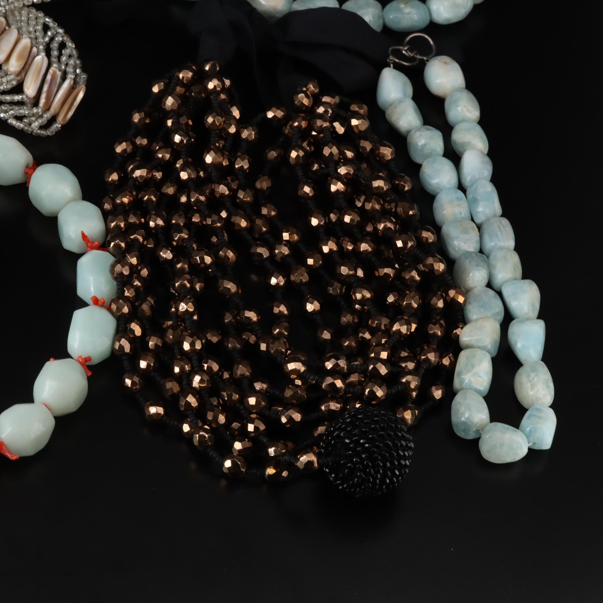 Necklaces and Brooches Including Sterling with Smoky Quartz, Glass and Coral