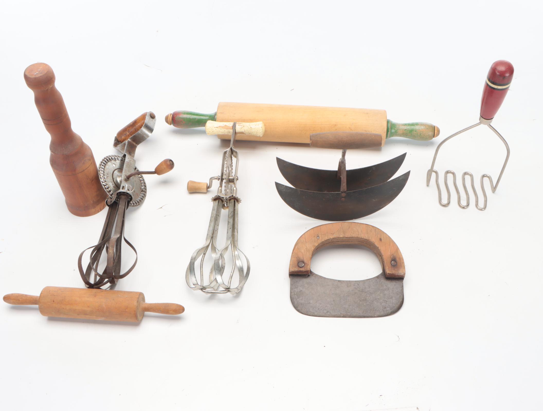 Primitive Wooden Dough Bowl with Wire Baskets and Other Kitchenware