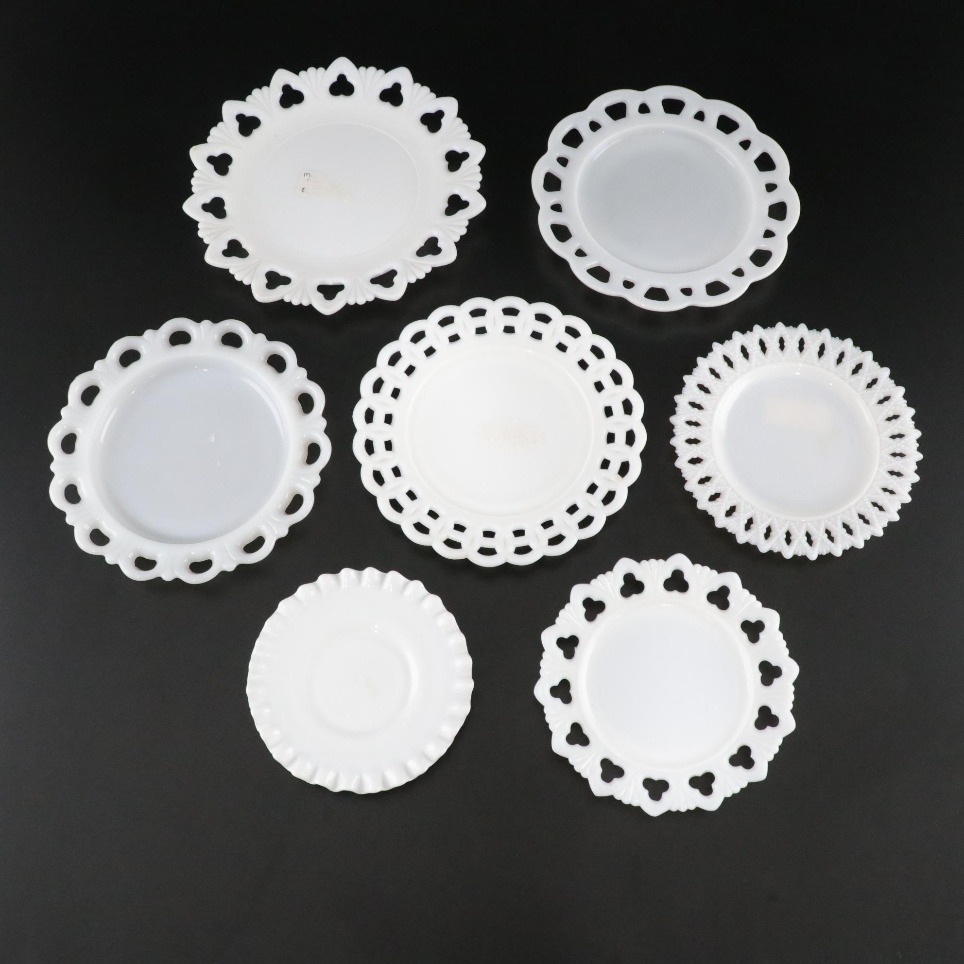 Seven Milk Glass Plates