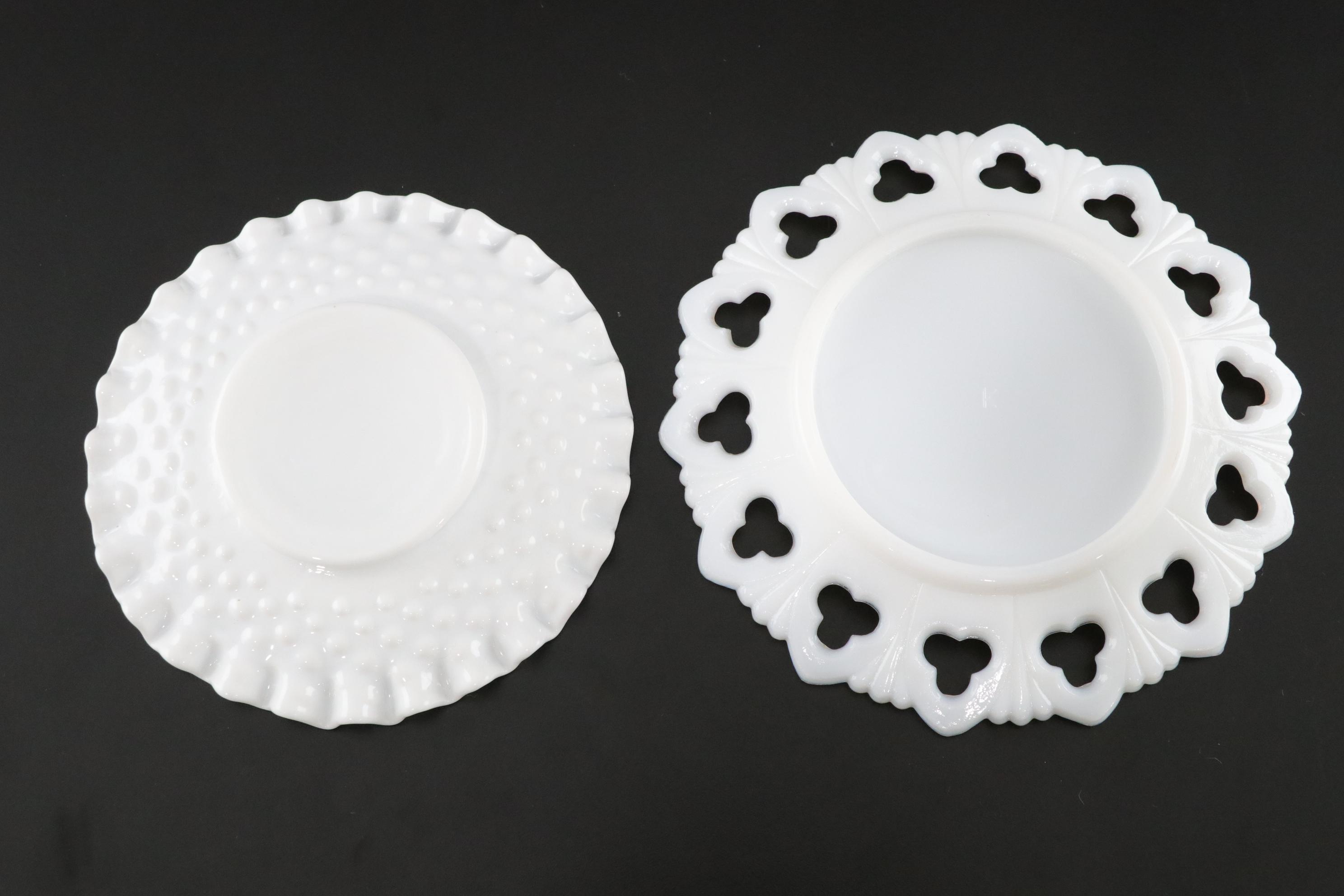 Seven Milk Glass Plates