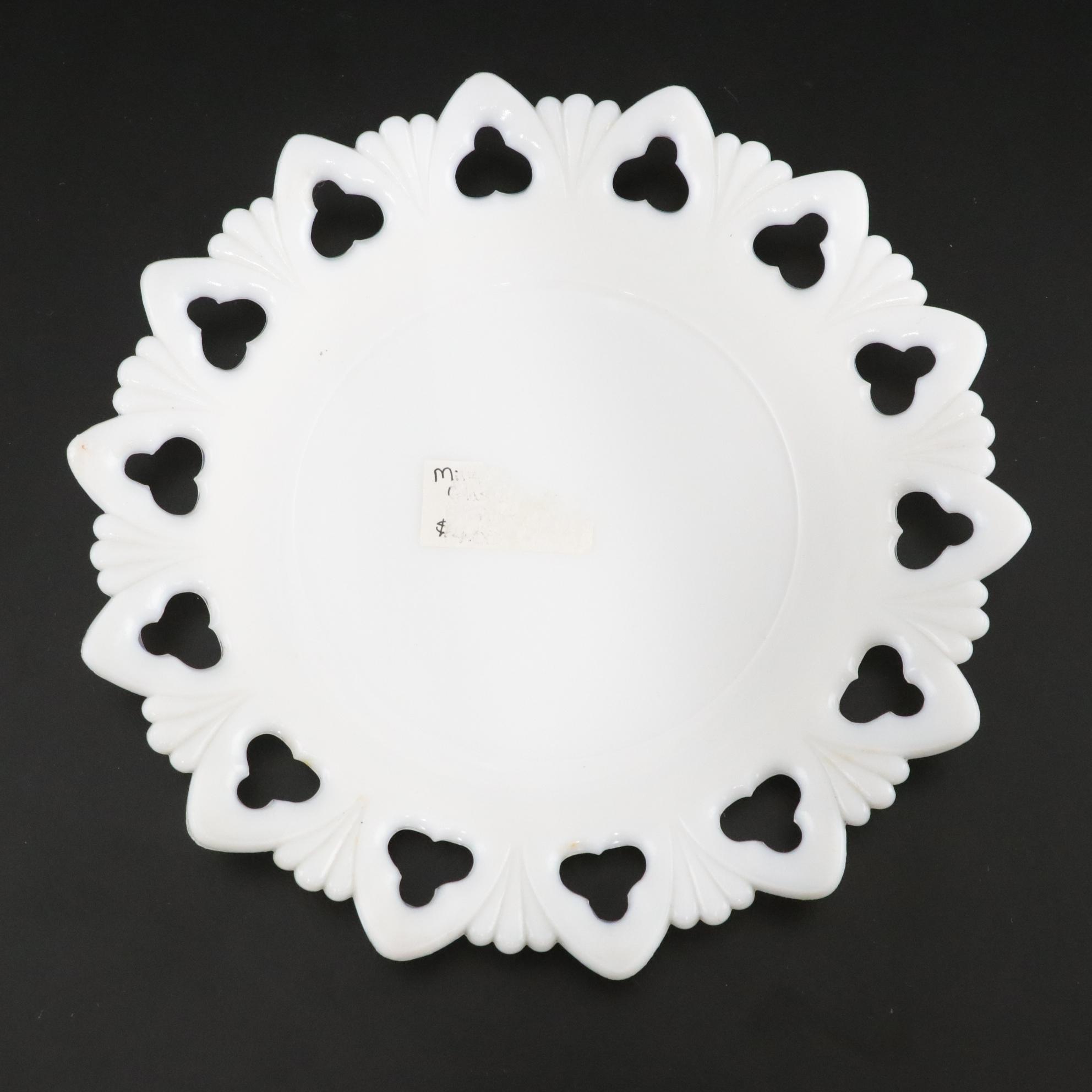 Seven Milk Glass Plates