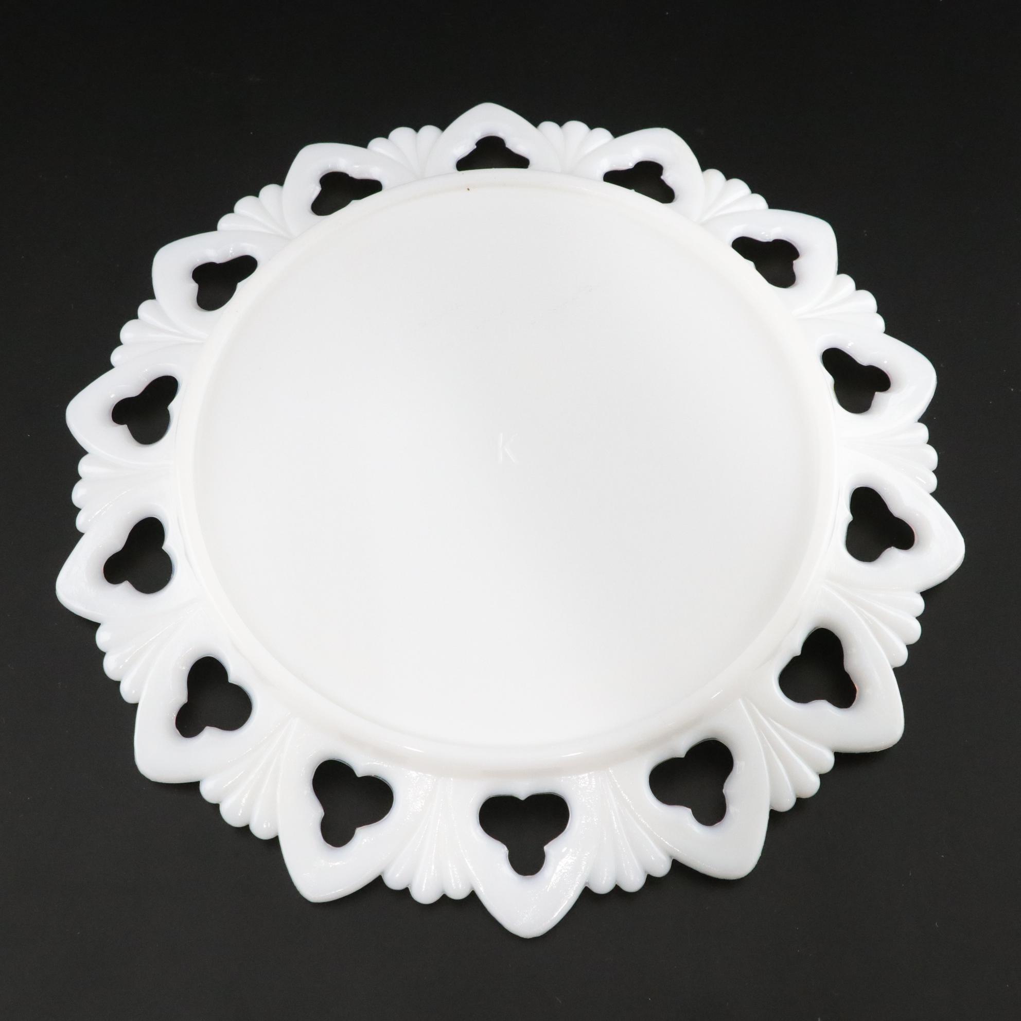 Seven Milk Glass Plates