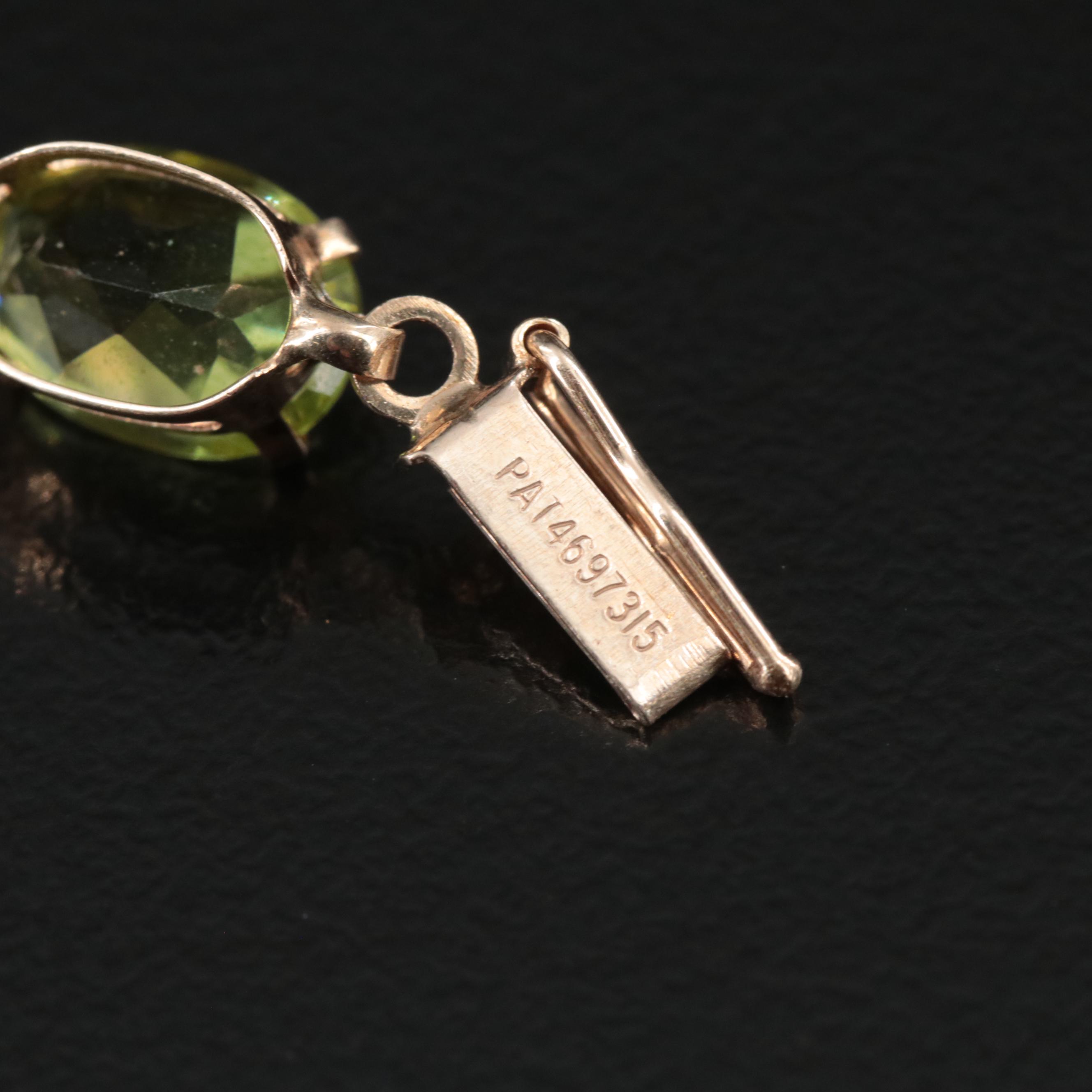 10K Peridot Line Bracelet