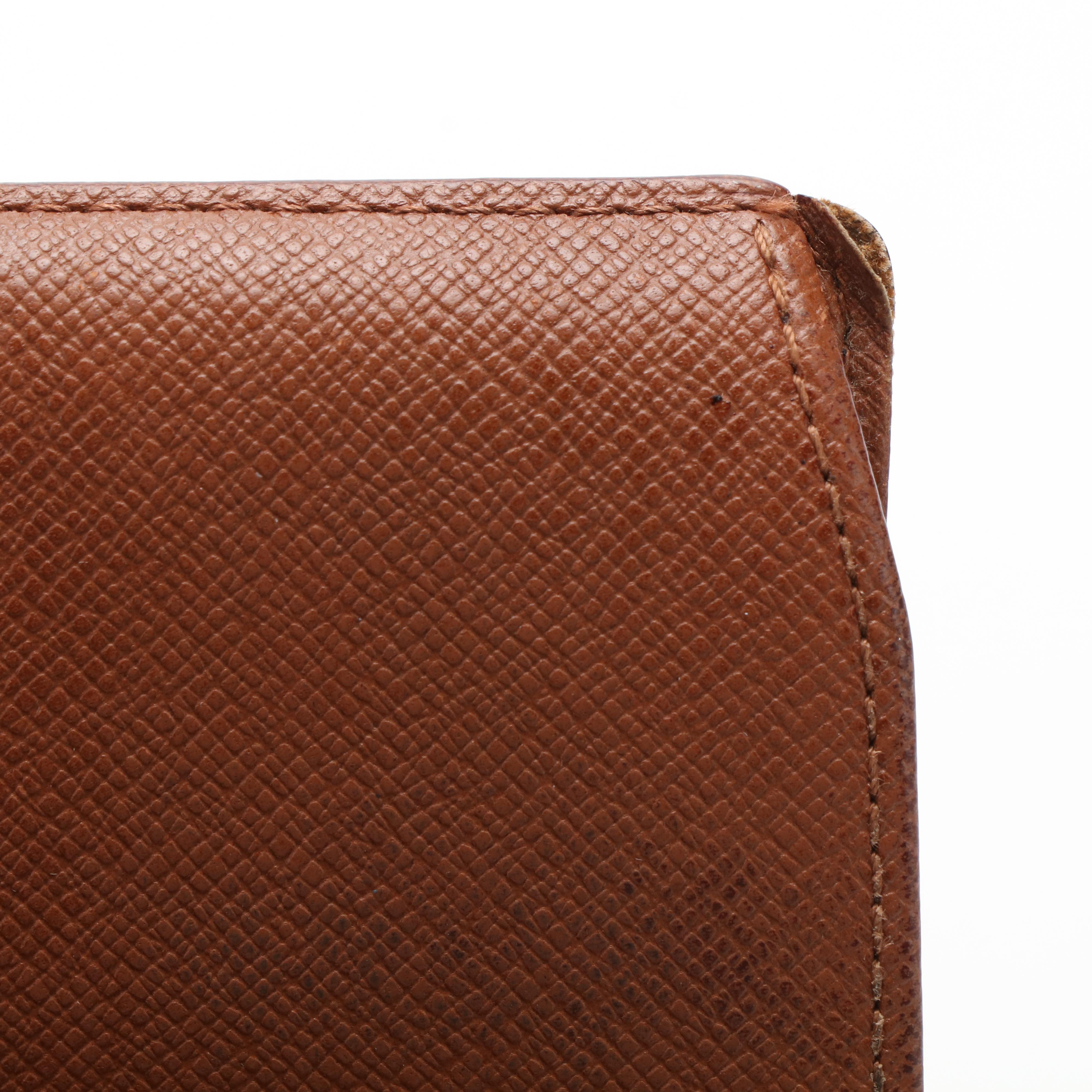 Louis Vuitton Porte Tresor Wallet in Monogram Coated Canvas