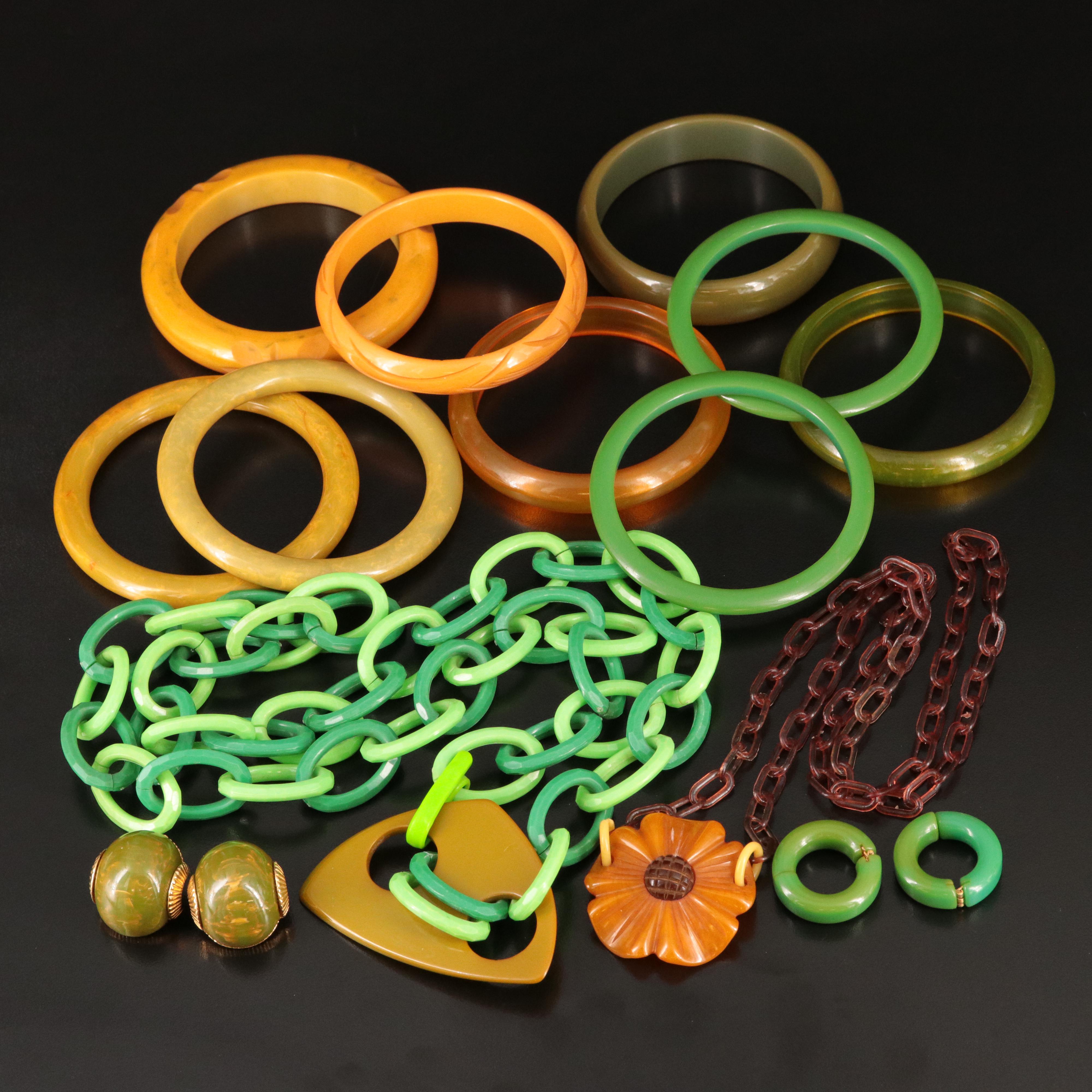 Bakelite Jewelry Selection with Deep Carved Bangles and Marvella Clip Earrings