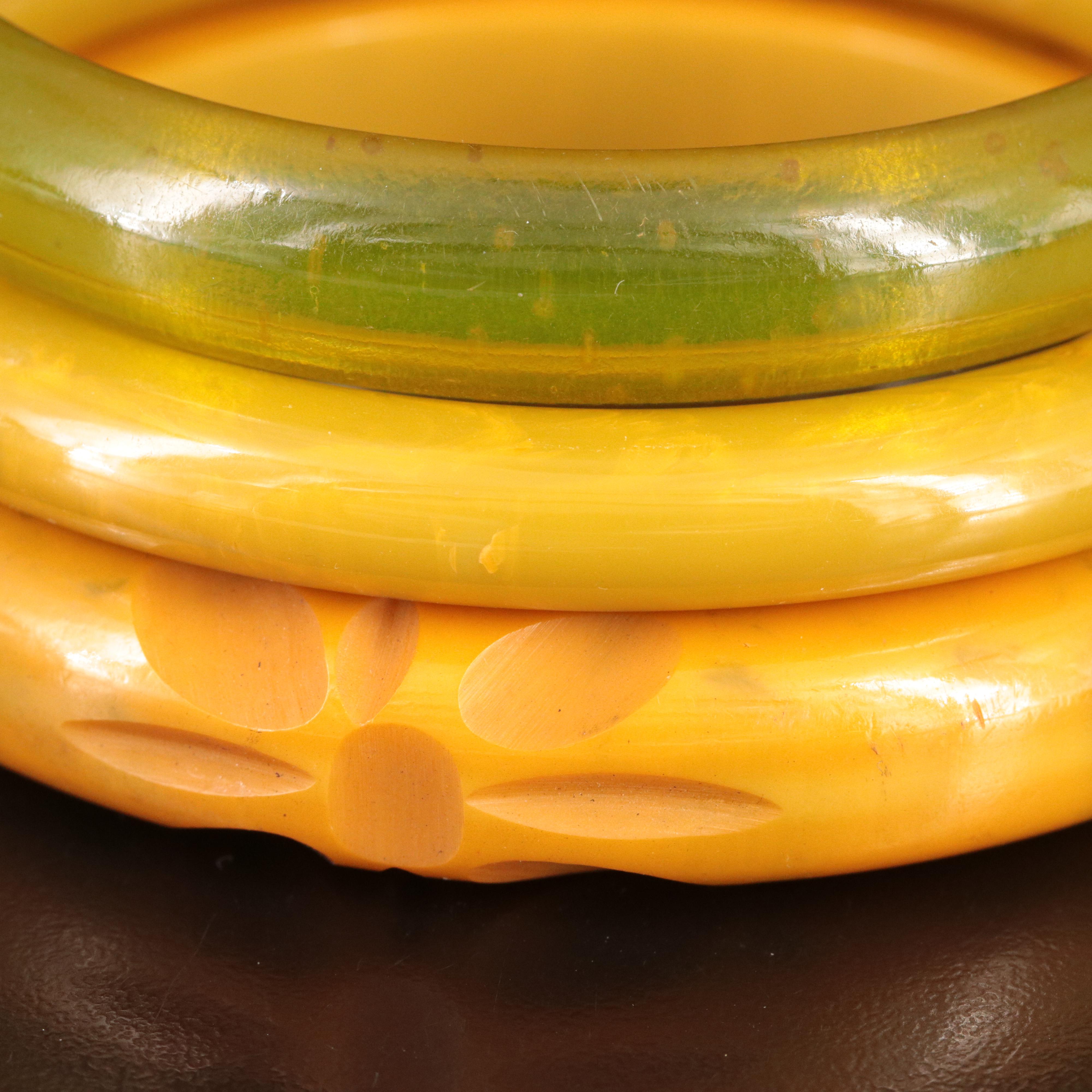 Bakelite Jewelry Selection with Deep Carved Bangles and Marvella Clip Earrings