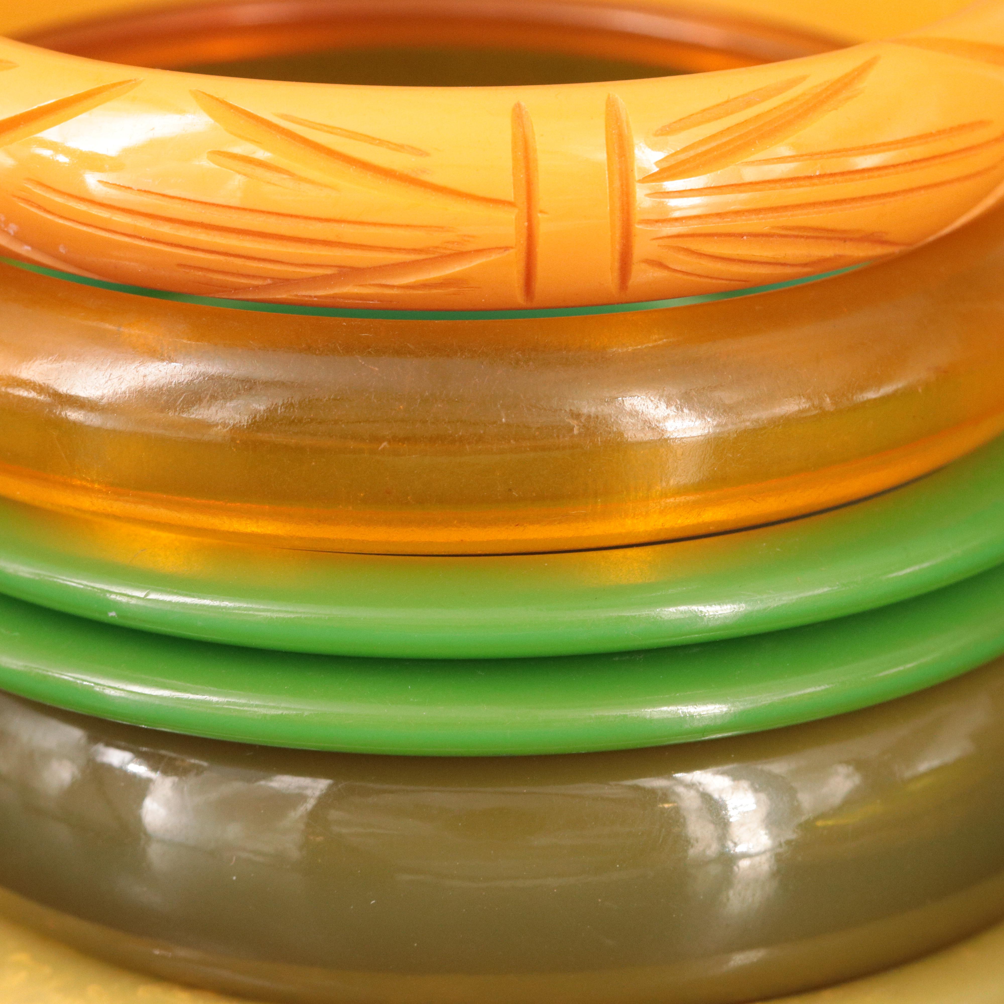 Bakelite Jewelry Selection with Deep Carved Bangles and Marvella Clip Earrings