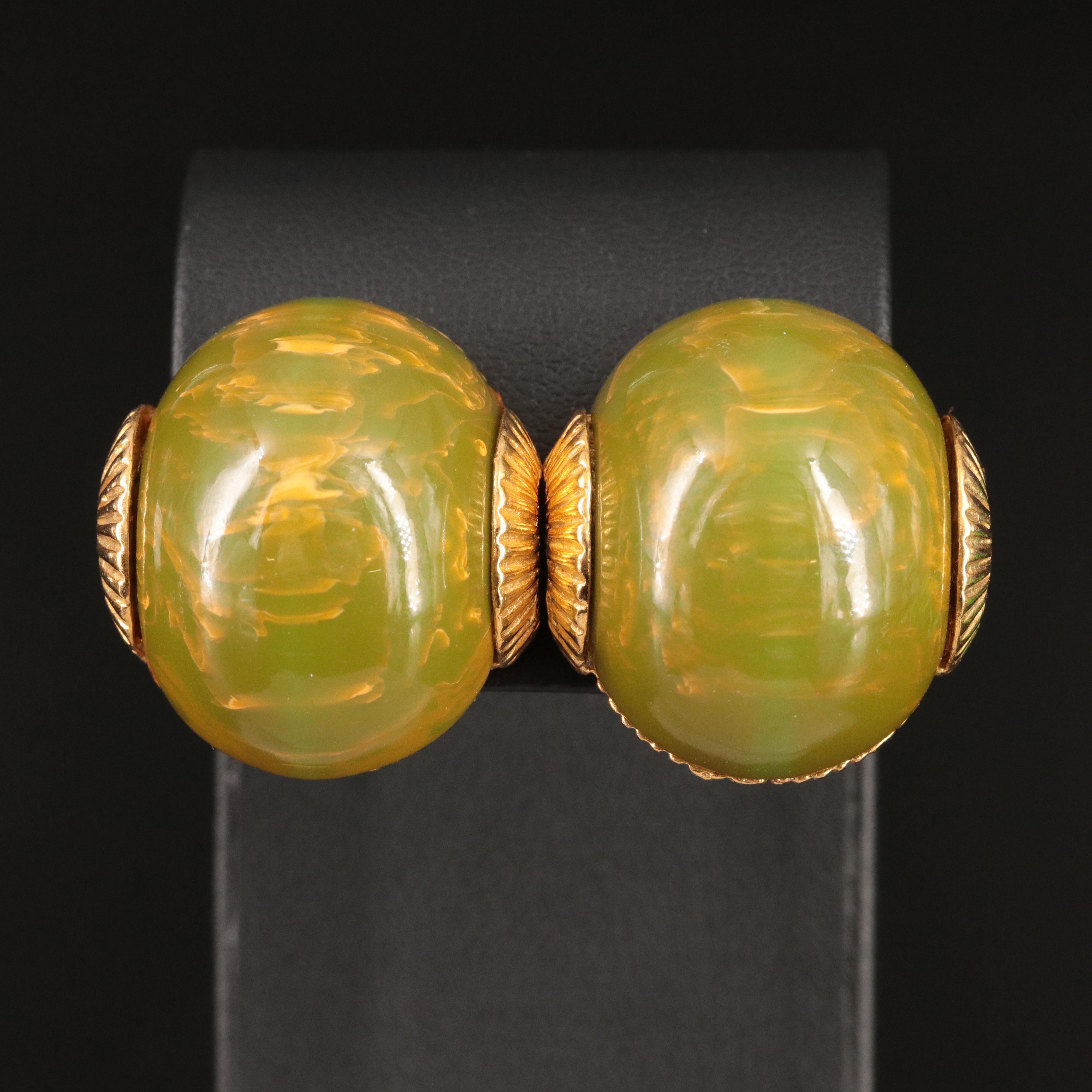 Bakelite Jewelry Selection with Deep Carved Bangles and Marvella Clip Earrings