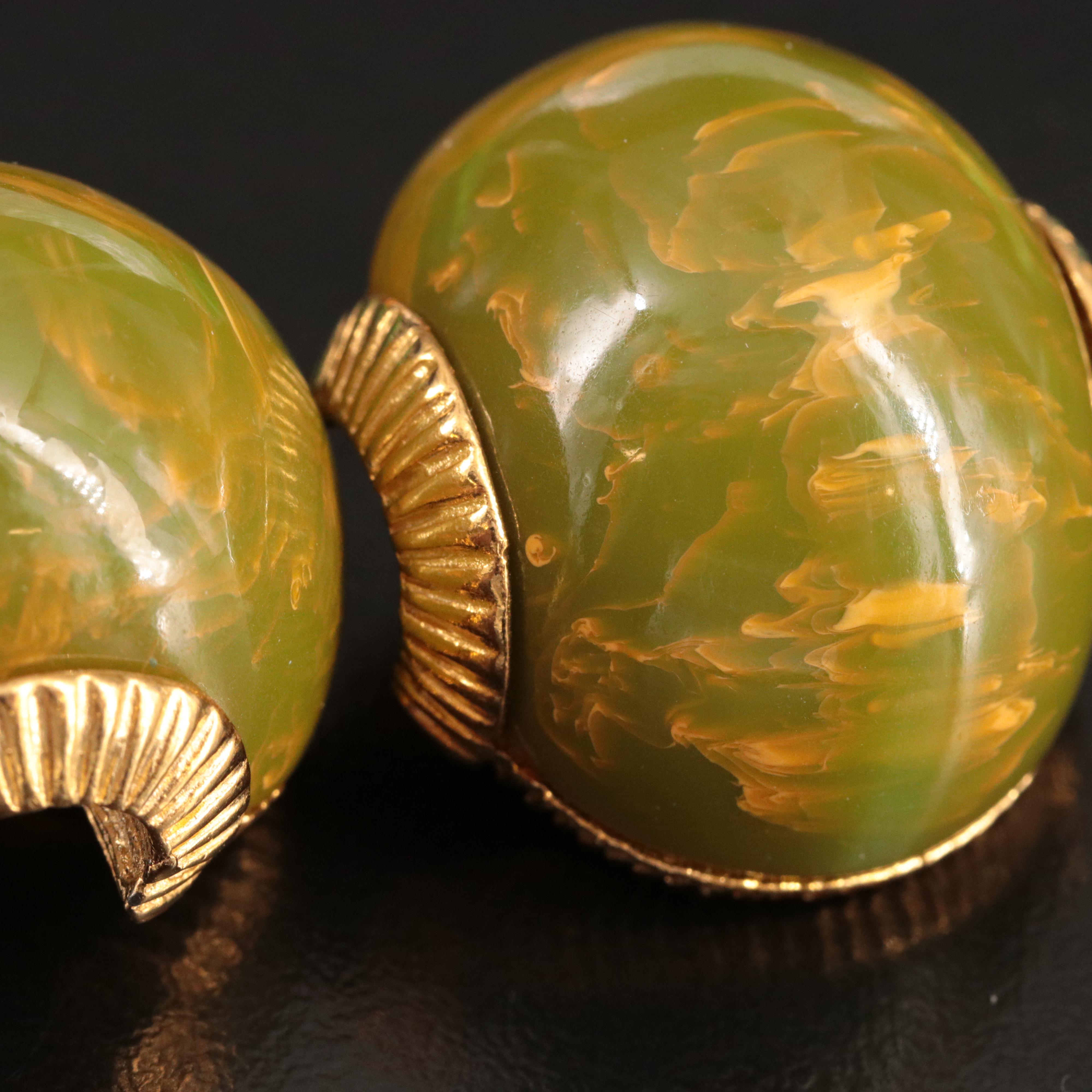 Bakelite Jewelry Selection with Deep Carved Bangles and Marvella Clip Earrings