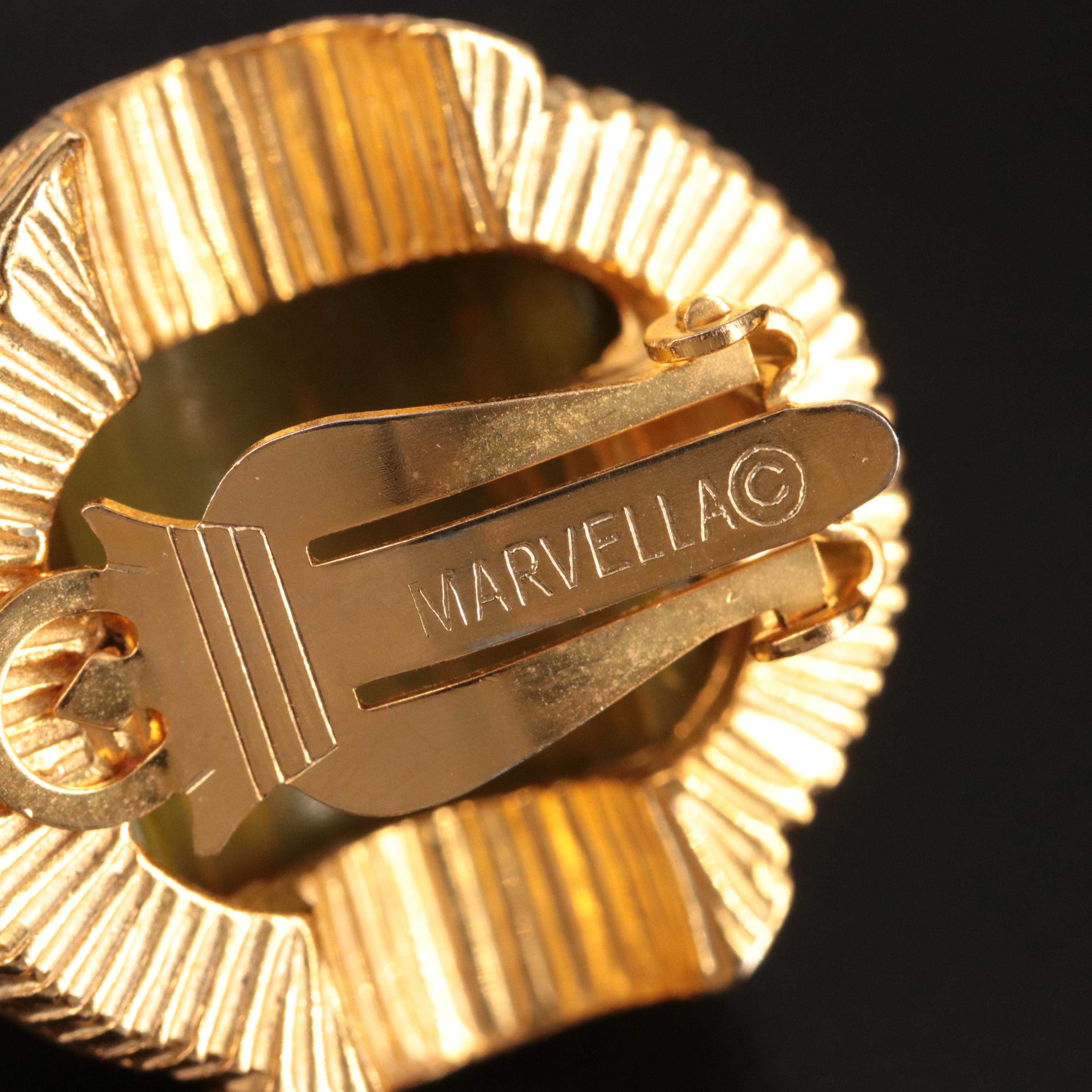 Bakelite Jewelry Selection with Deep Carved Bangles and Marvella Clip Earrings