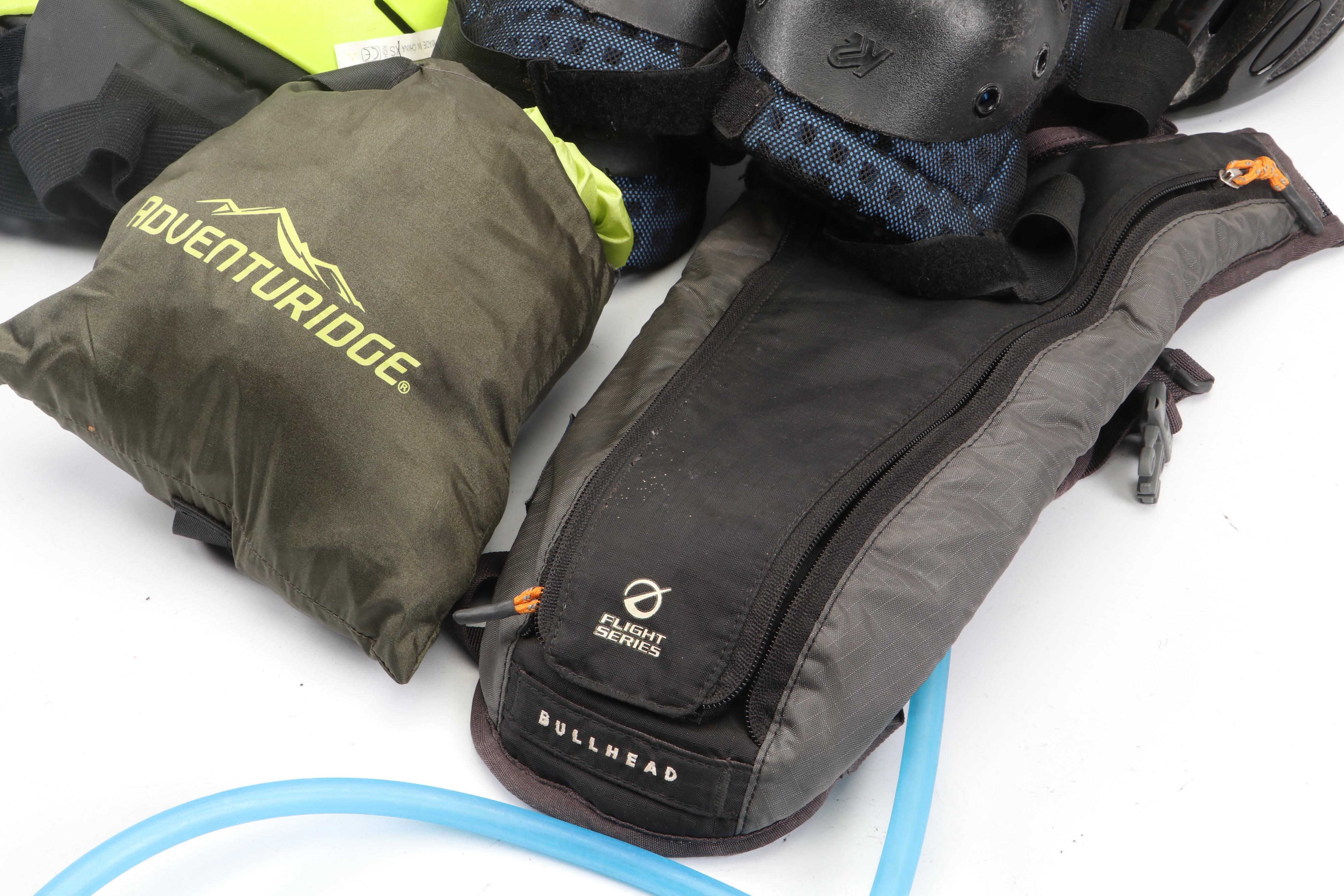 The North Face Hydration Pack with Bike Helmets, Kneepads, Bike Lock and More