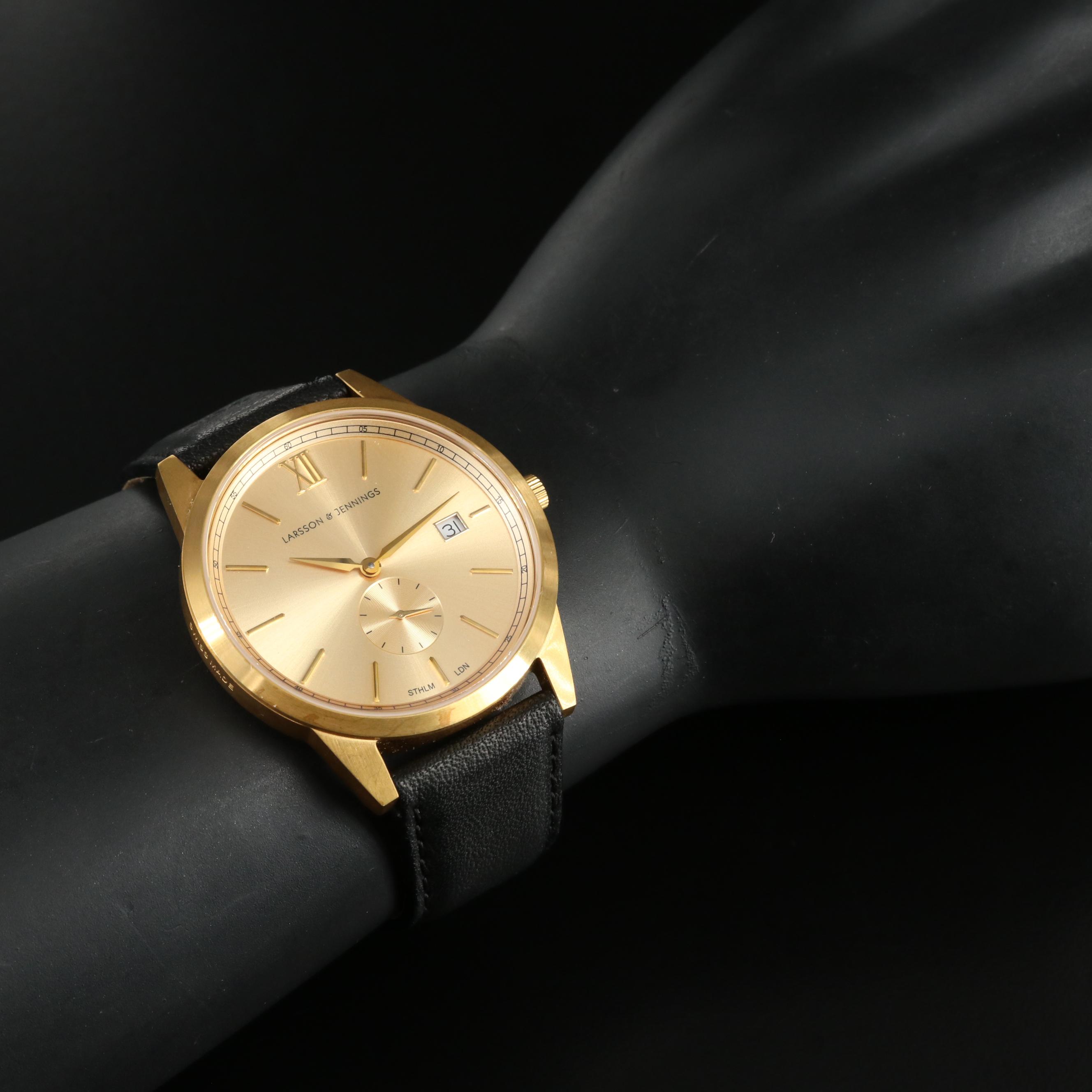 Larsson and Jennings Gold Tone Date Watch