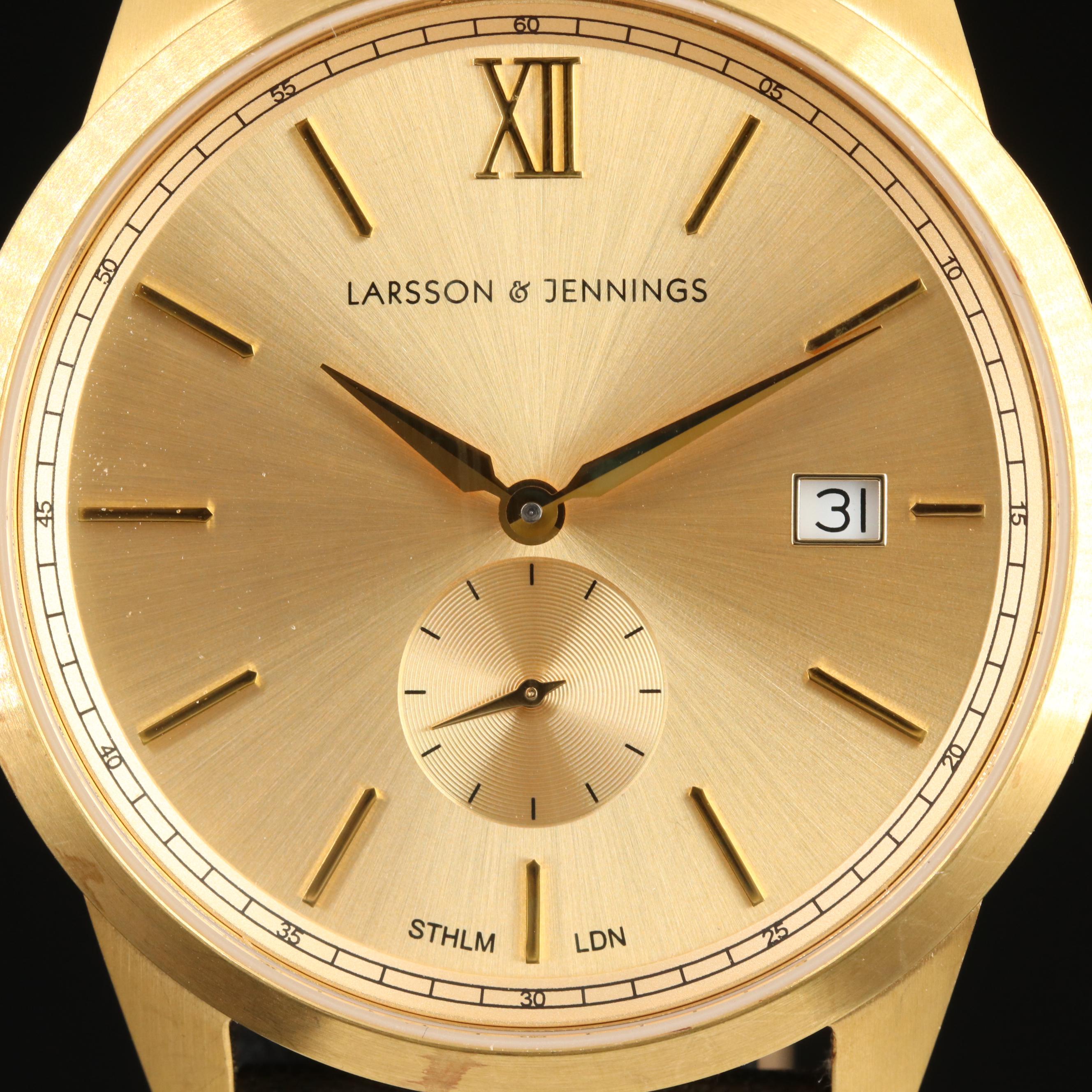 Larsson and Jennings Gold Tone Date Watch