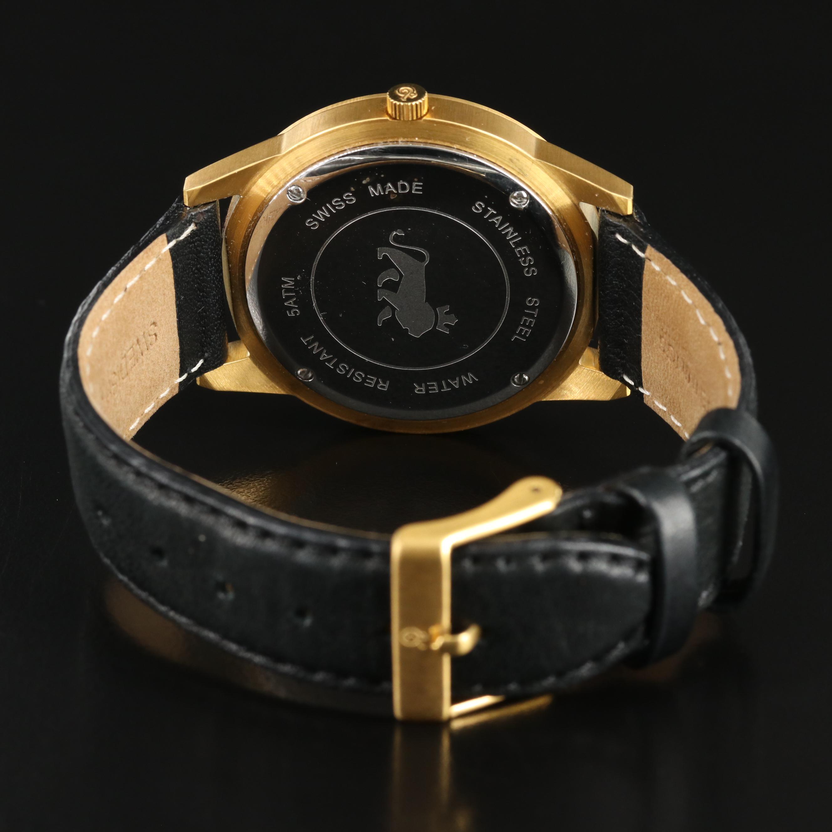 Larsson and Jennings Gold Tone Date Watch