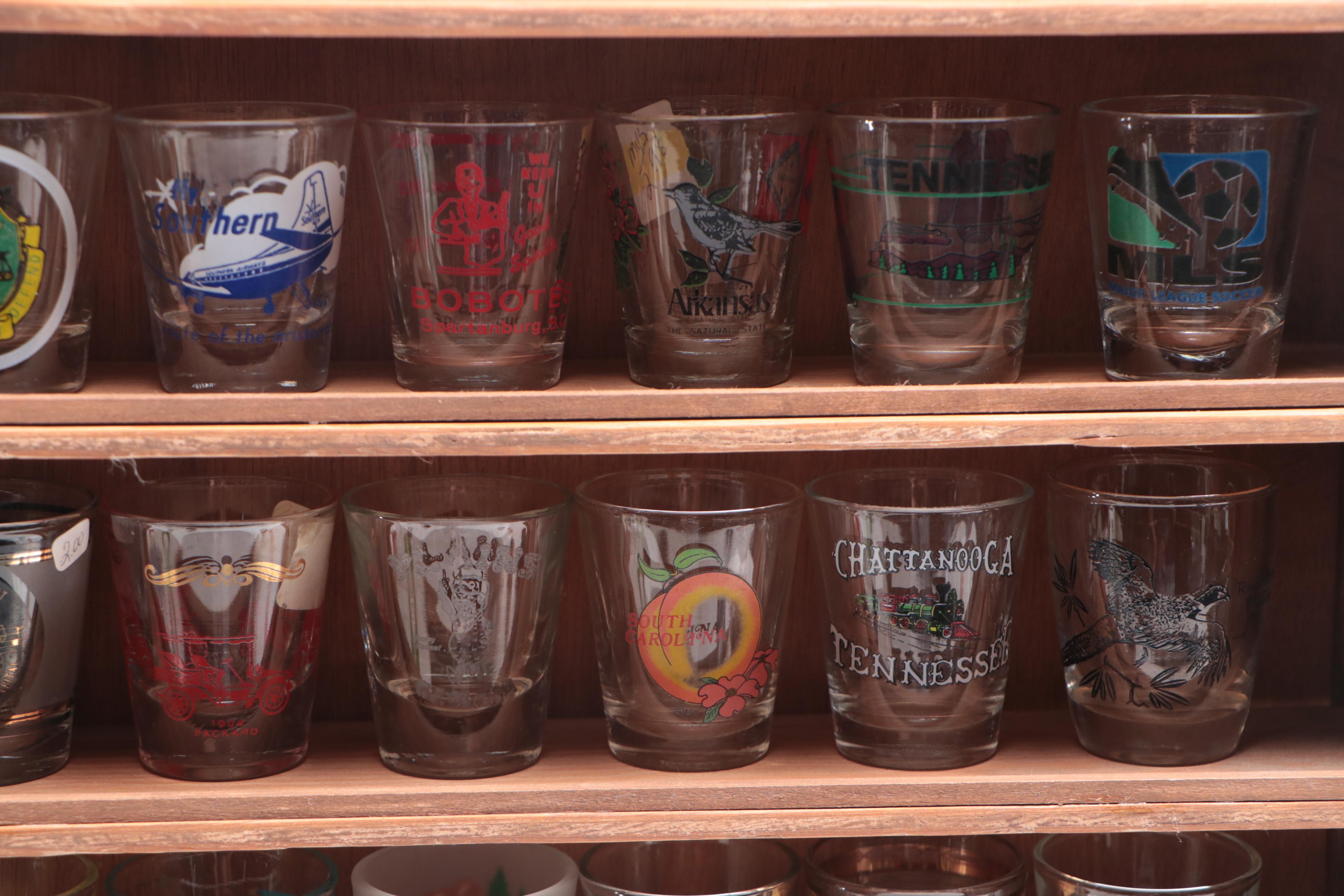 Souvenir and Collectible Shot Glasses with Display Rack