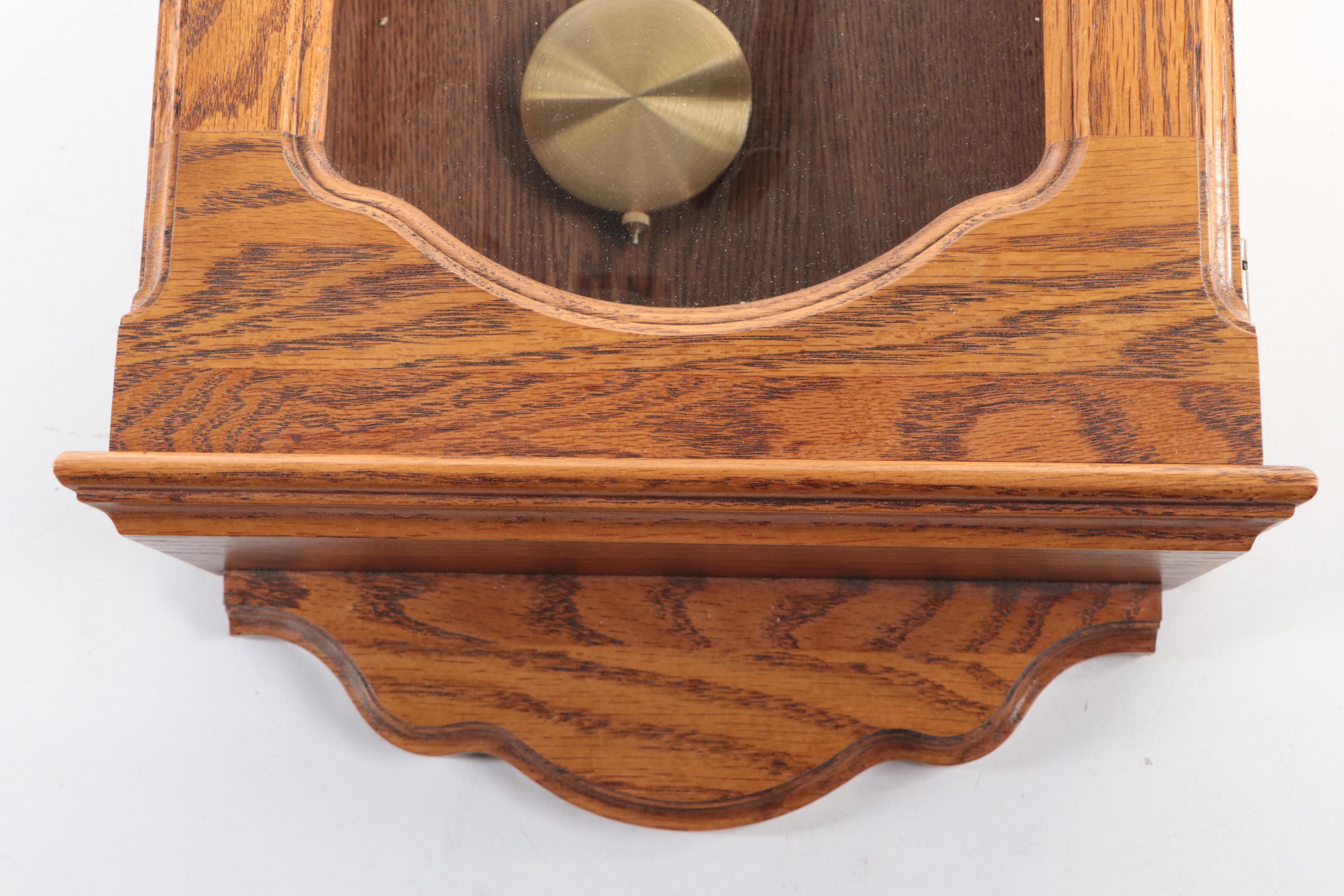 Howard Miller Oak Wall Clock with Westminster Chime