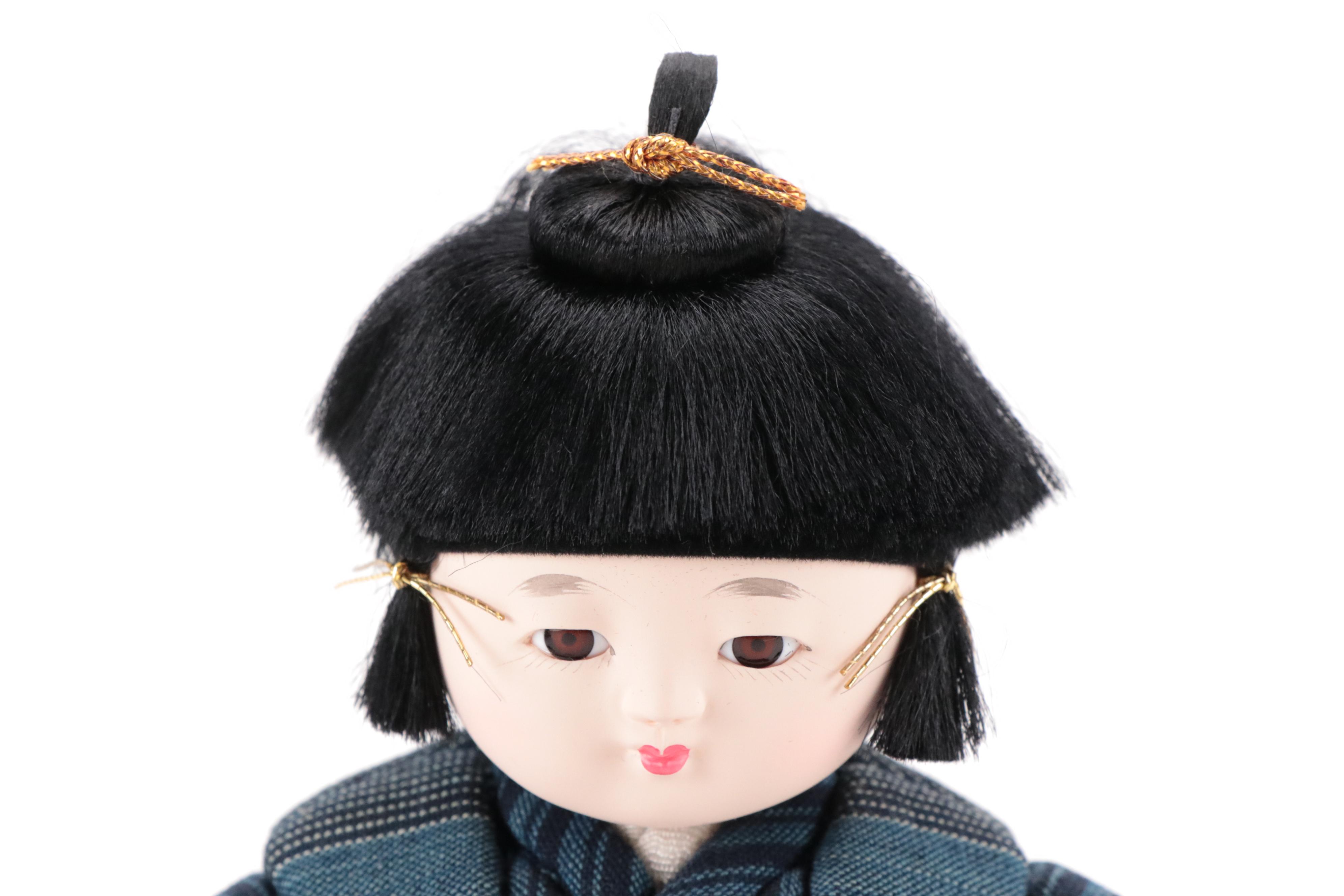 Pair of Japanese Dolls in Matsusaka Momen Clothing with Wooden Bases and Booklet