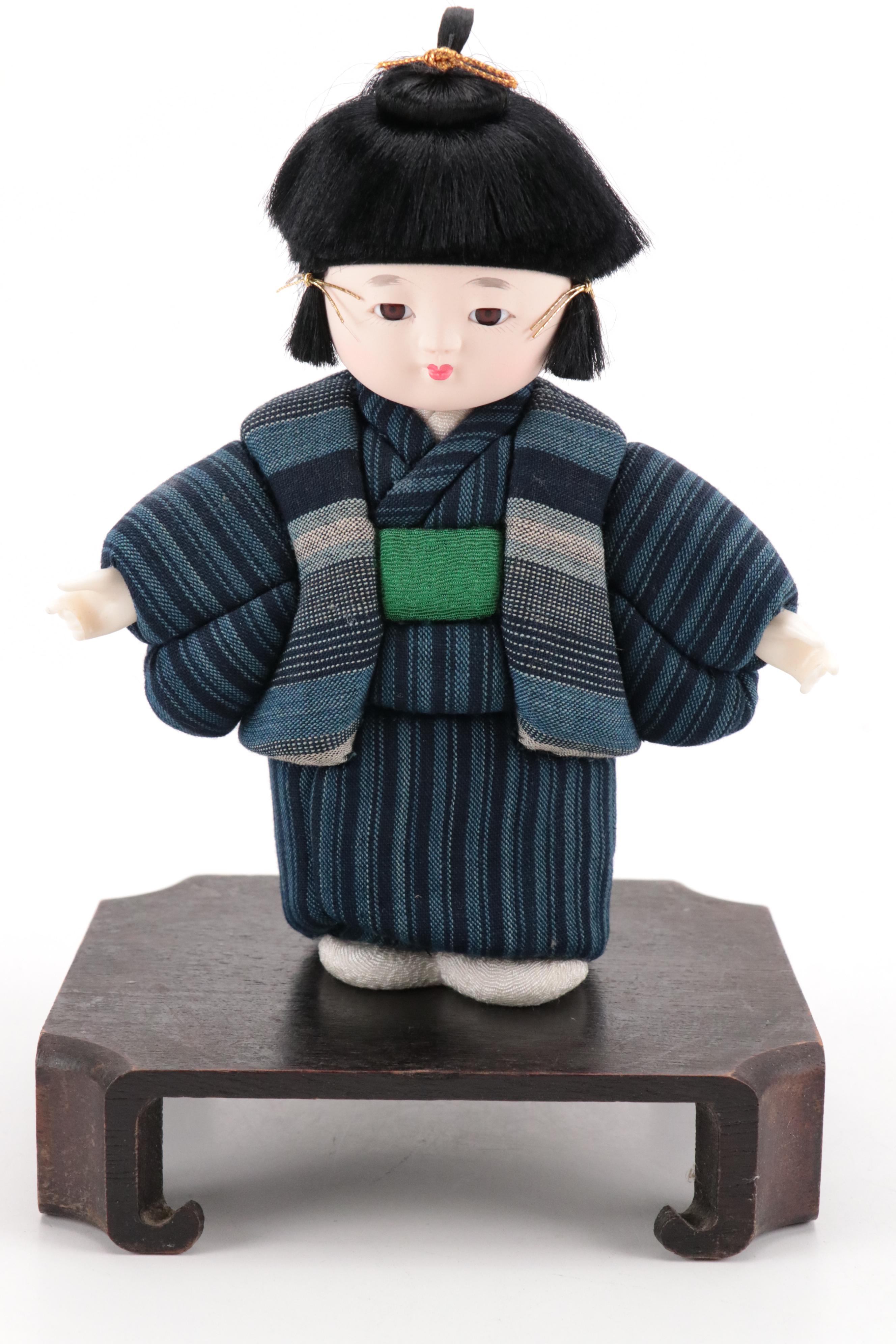 Pair of Japanese Dolls in Matsusaka Momen Clothing with Wooden Bases and Booklet