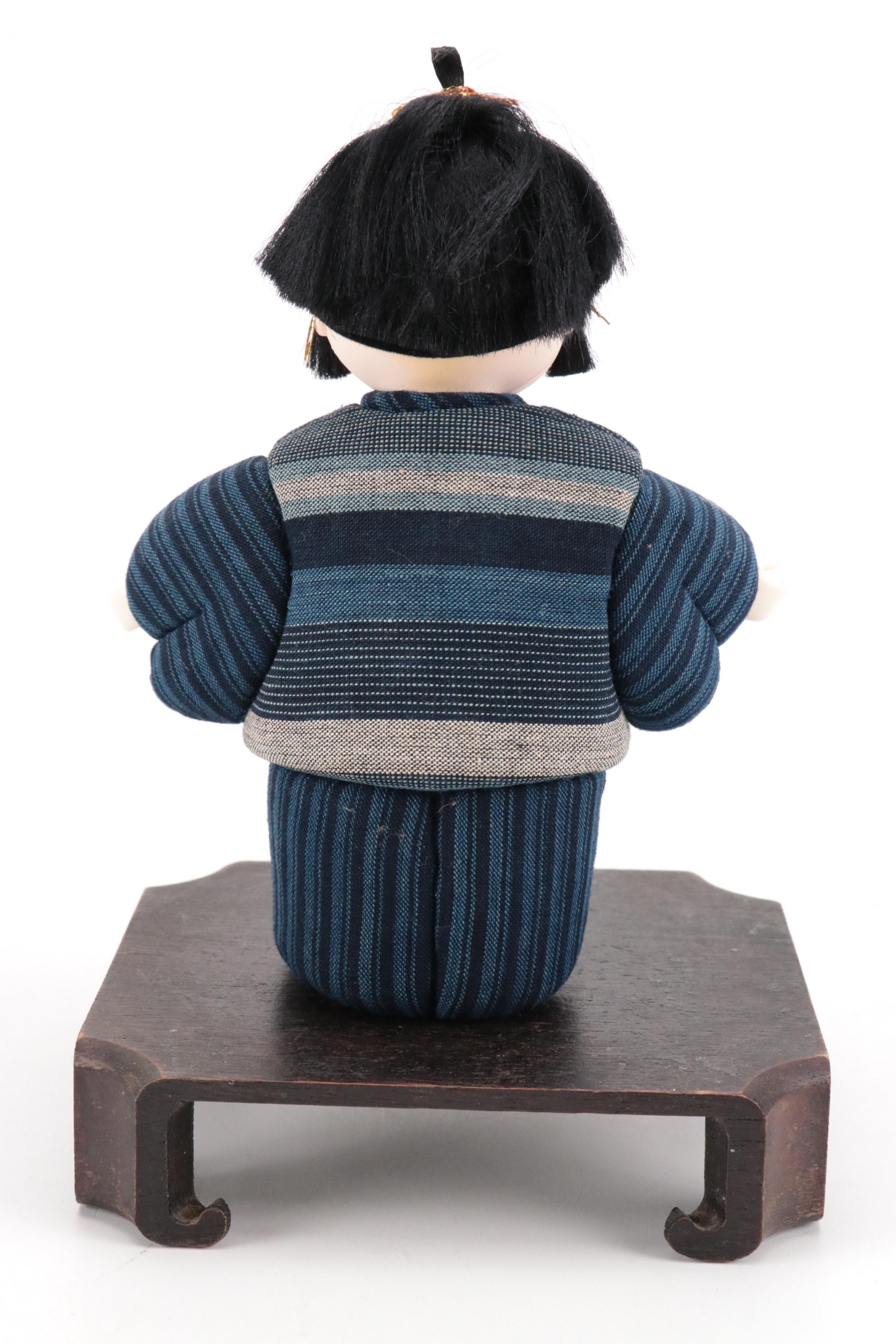 Pair of Japanese Dolls in Matsusaka Momen Clothing with Wooden Bases and Booklet