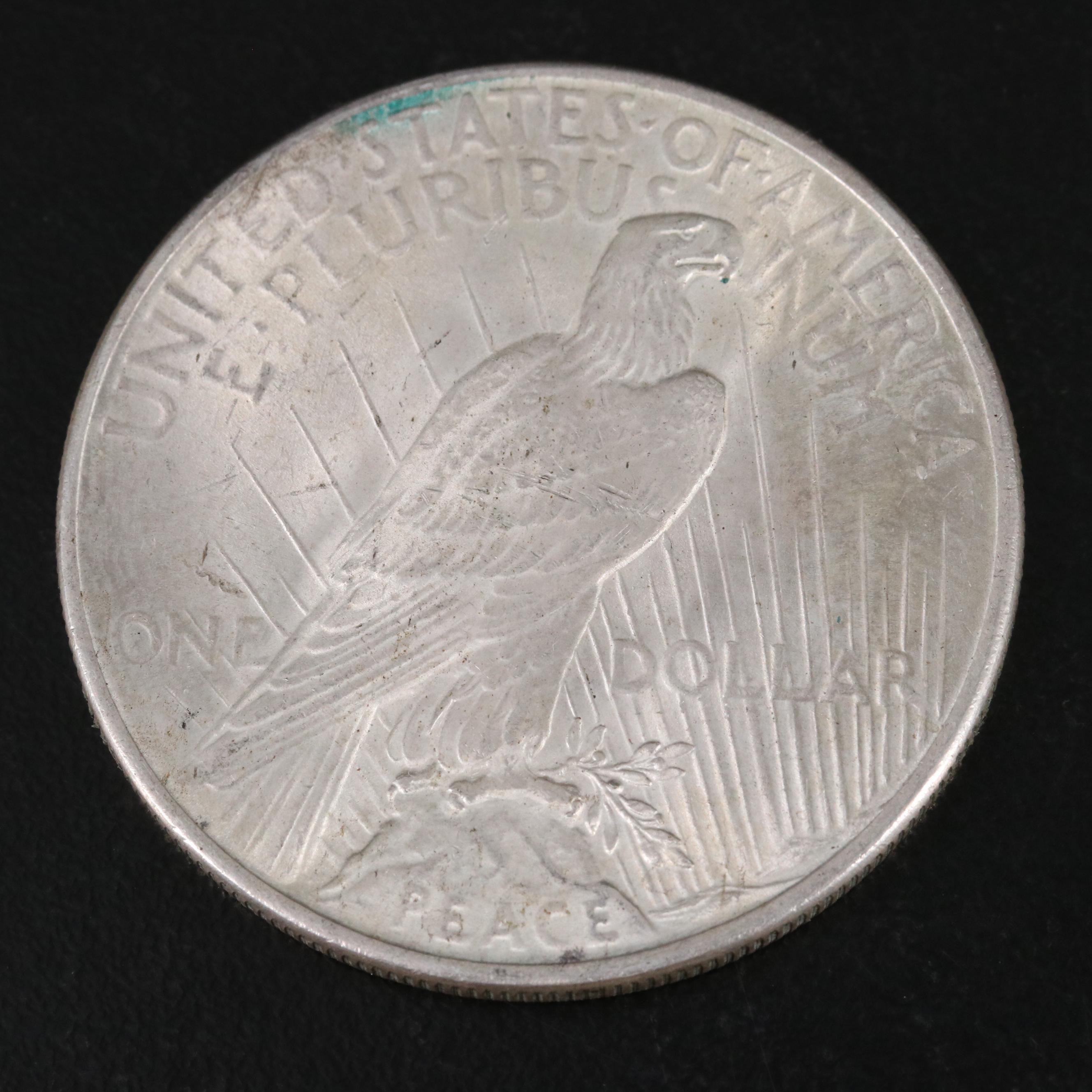 Three Different United States Peace Dollars with a 1925