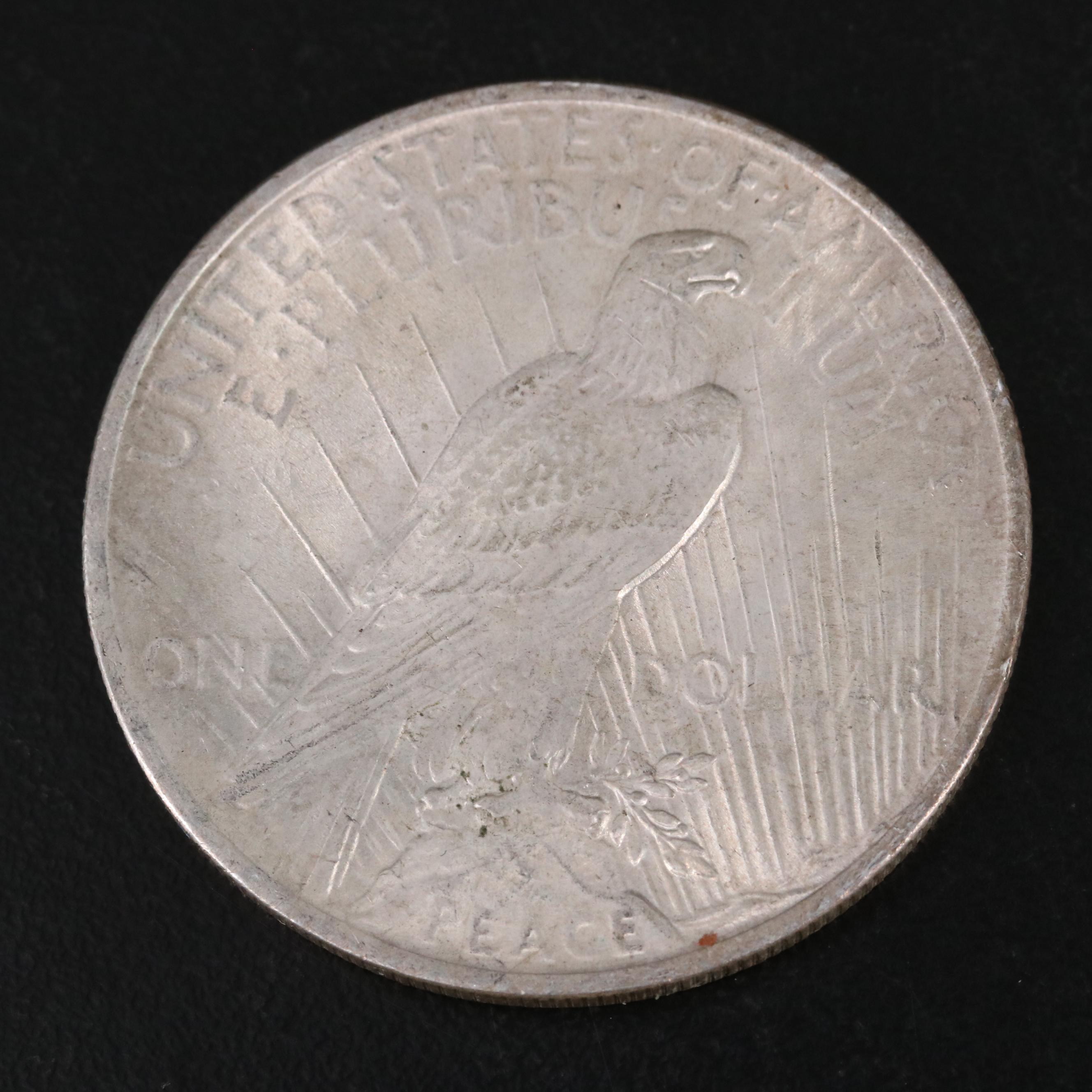 Three Different United States Peace Dollars with a 1925